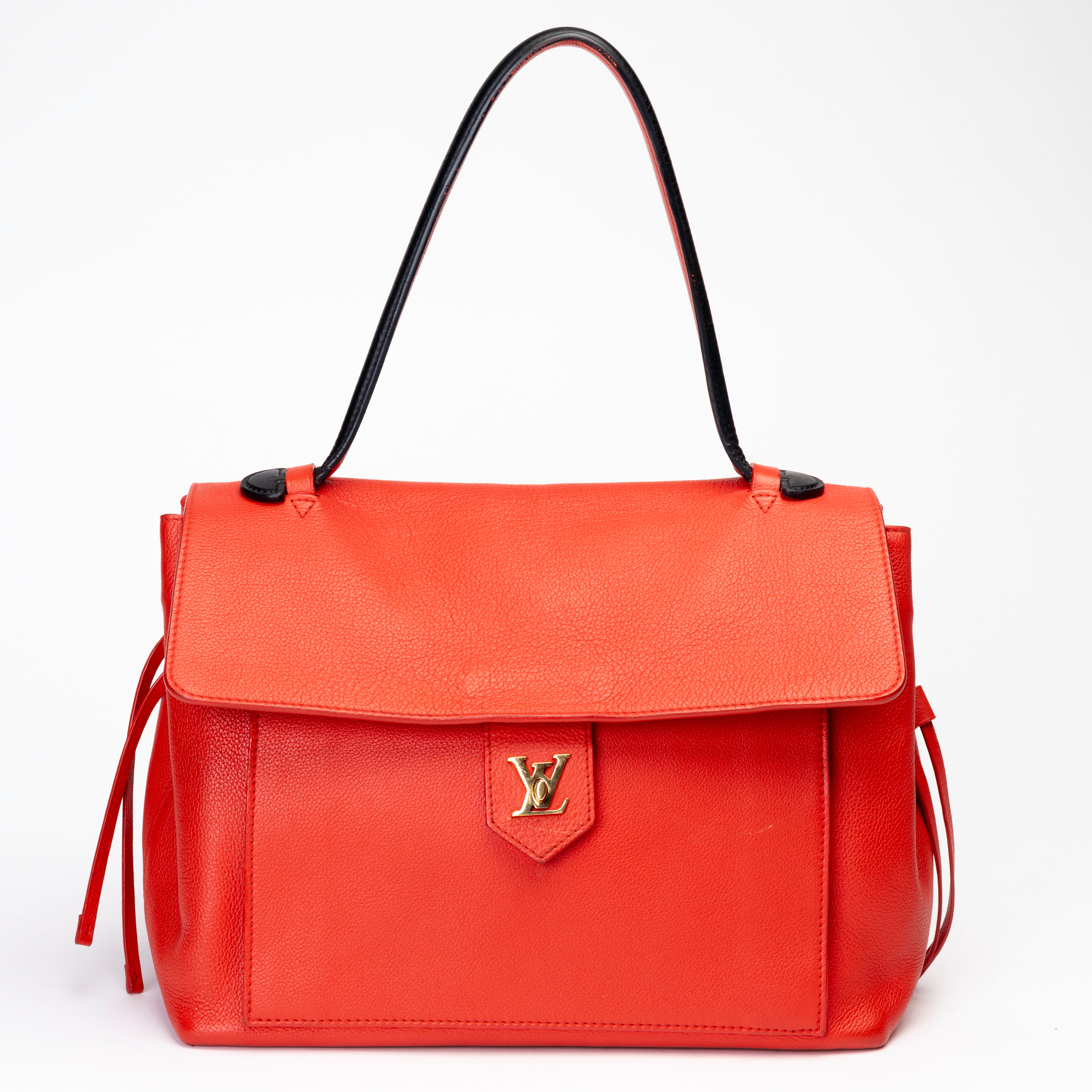 LOUIS VUITTON. Handväska, "Rubis Pebbled Leather Lockme PM Tote Bag".