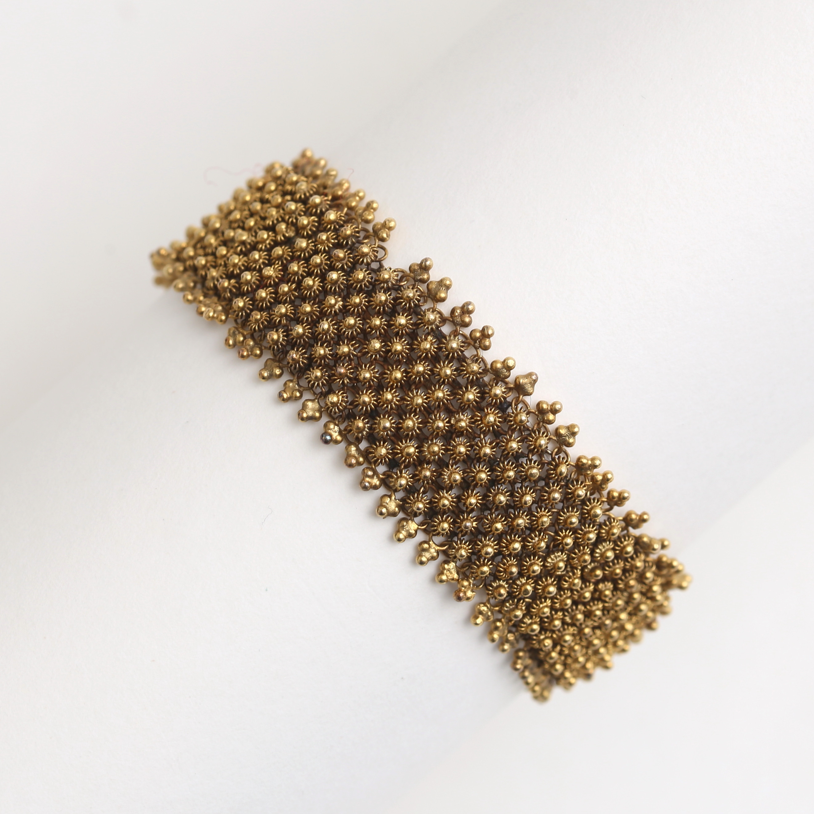 ARMLÄNK, x-länk, 18 k guld, 34,87 gram.