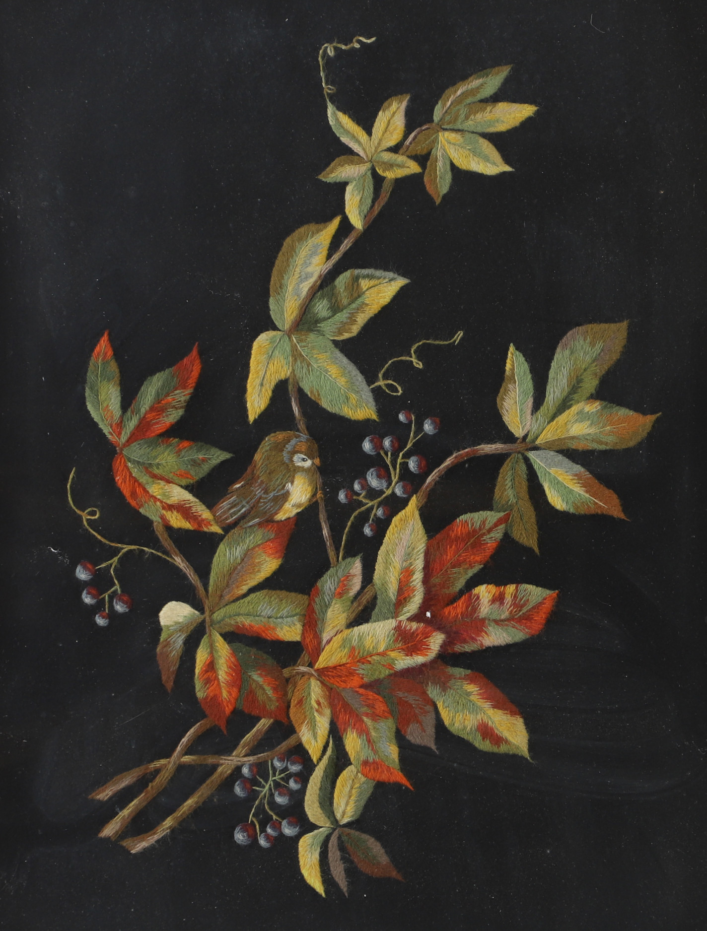 ULLBRODERI, fågel på gren, inramad, 1900-talets första hälft.