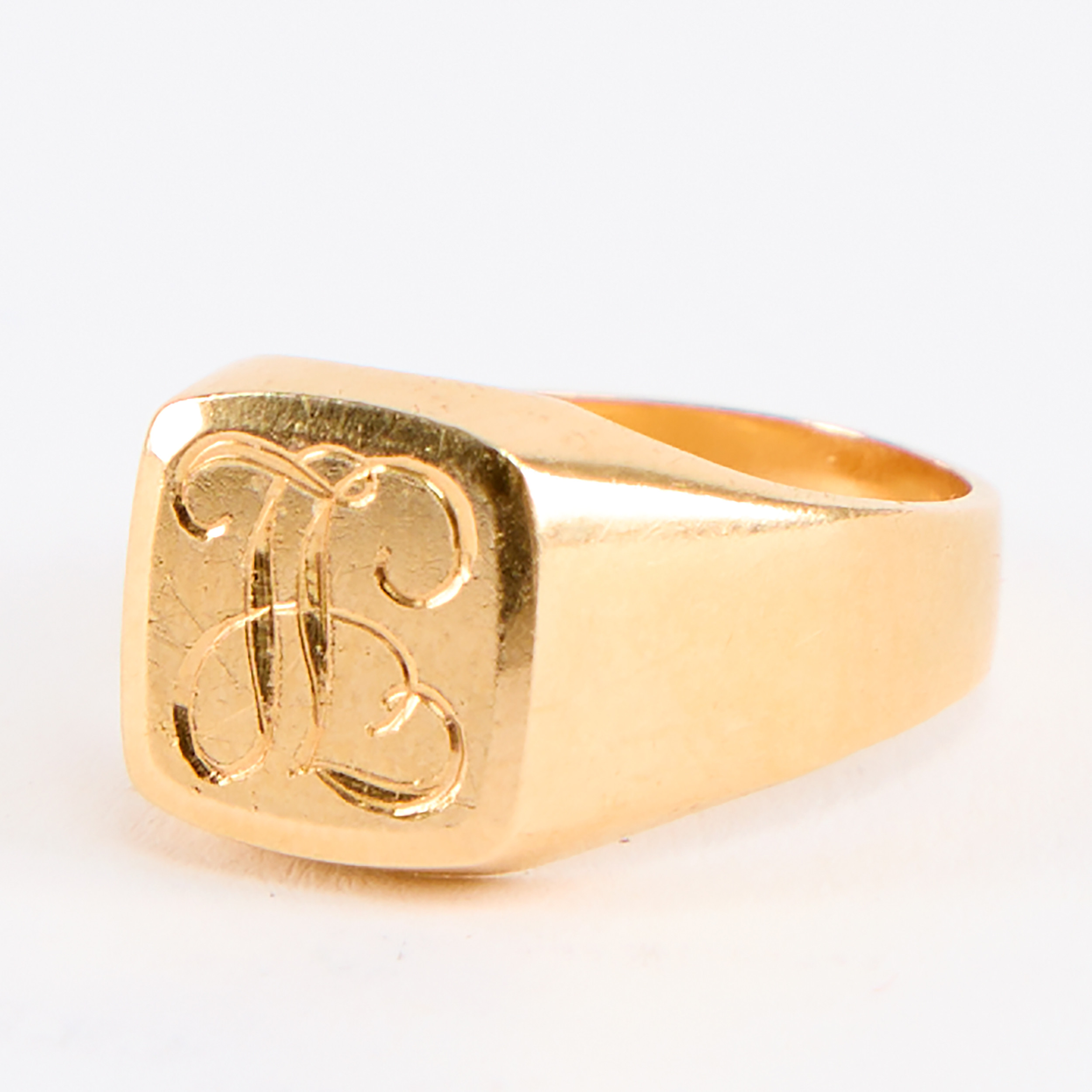 KLACKRING, guld 18K med monogram IL.