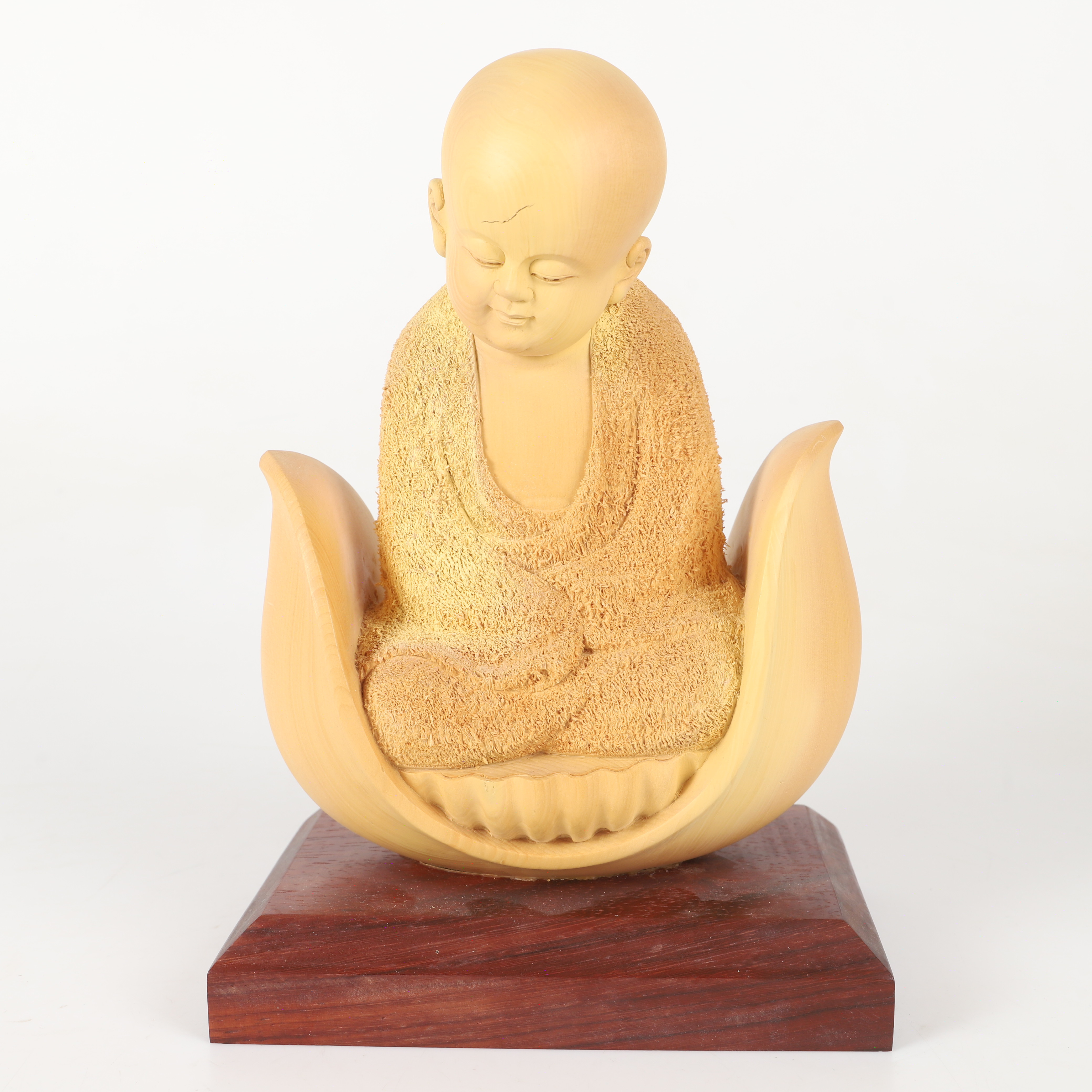 FIGURIN, munk på lotusknopp, trä, 1900-tal.