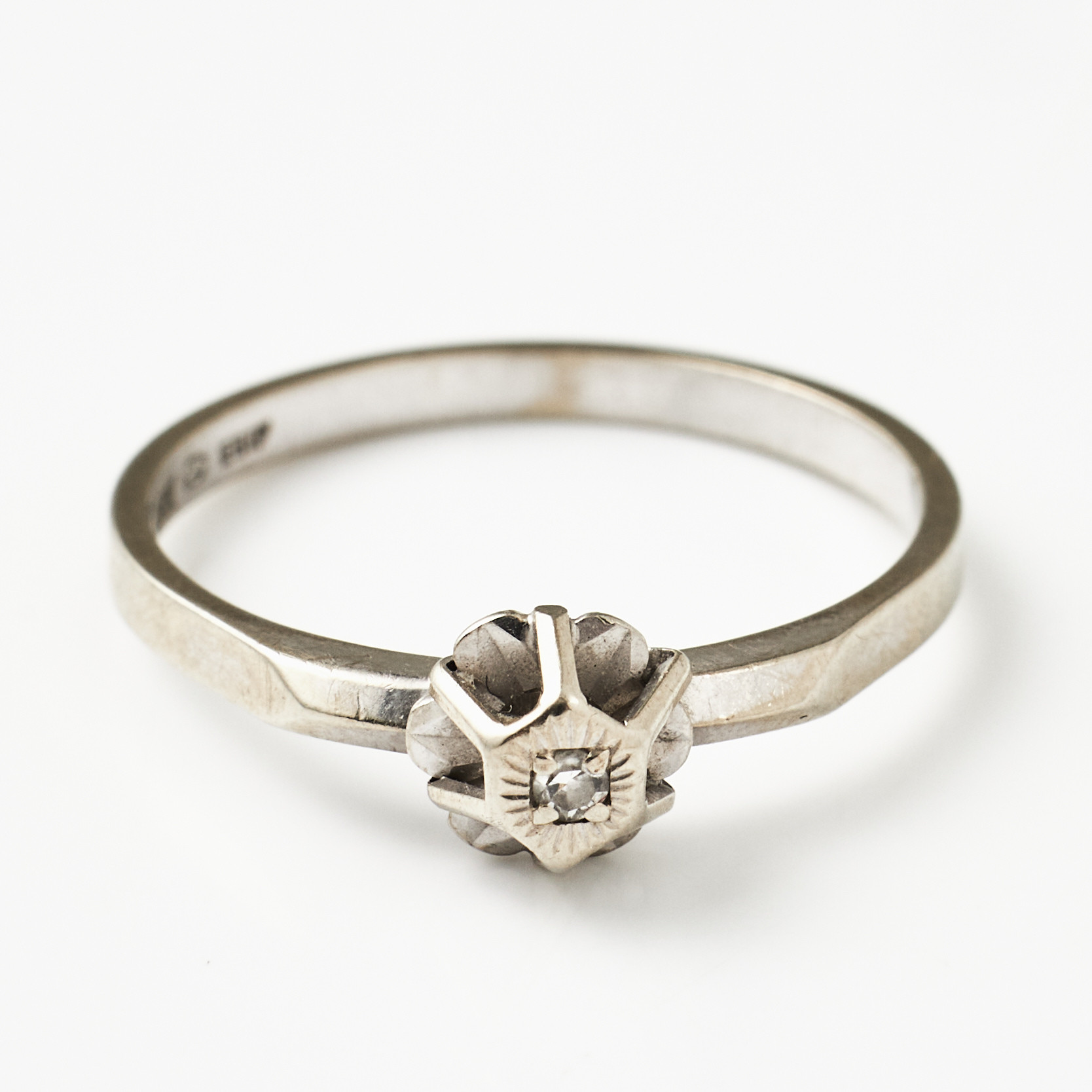 RING, 18 k rodierat vitguld, åttkantslipad diamant 0,02 ct, enligt gravyr, svensk kontrollstämpel.