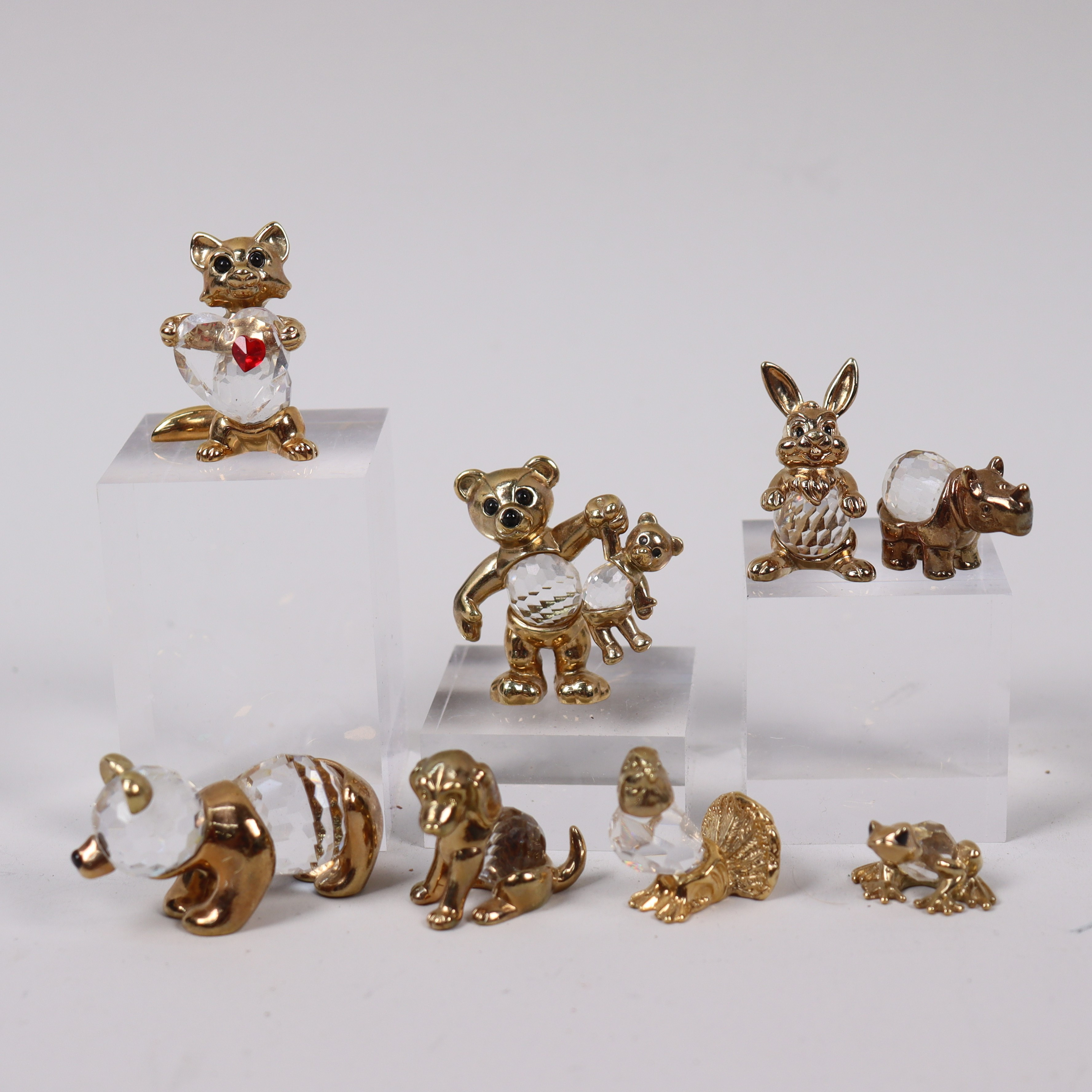 Swarovski, figuriner i mässing och kristall, 8 delar.