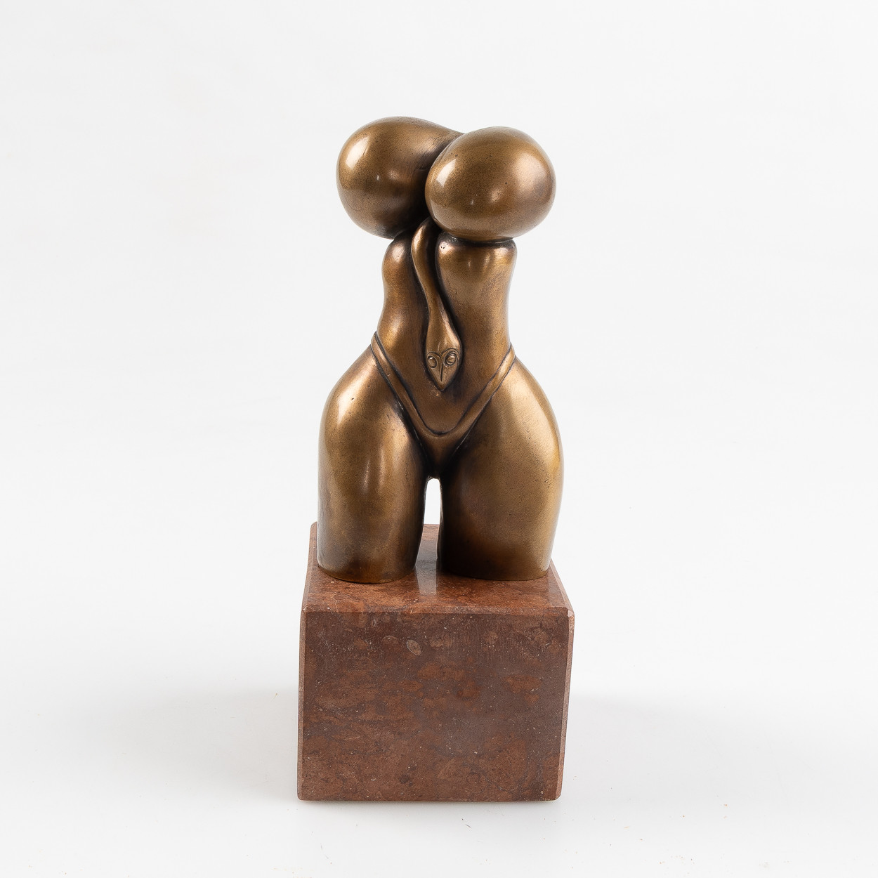 OKÄND KONSTNÄR. Skulptur, kvinnlig torso, brons, på stensockel.