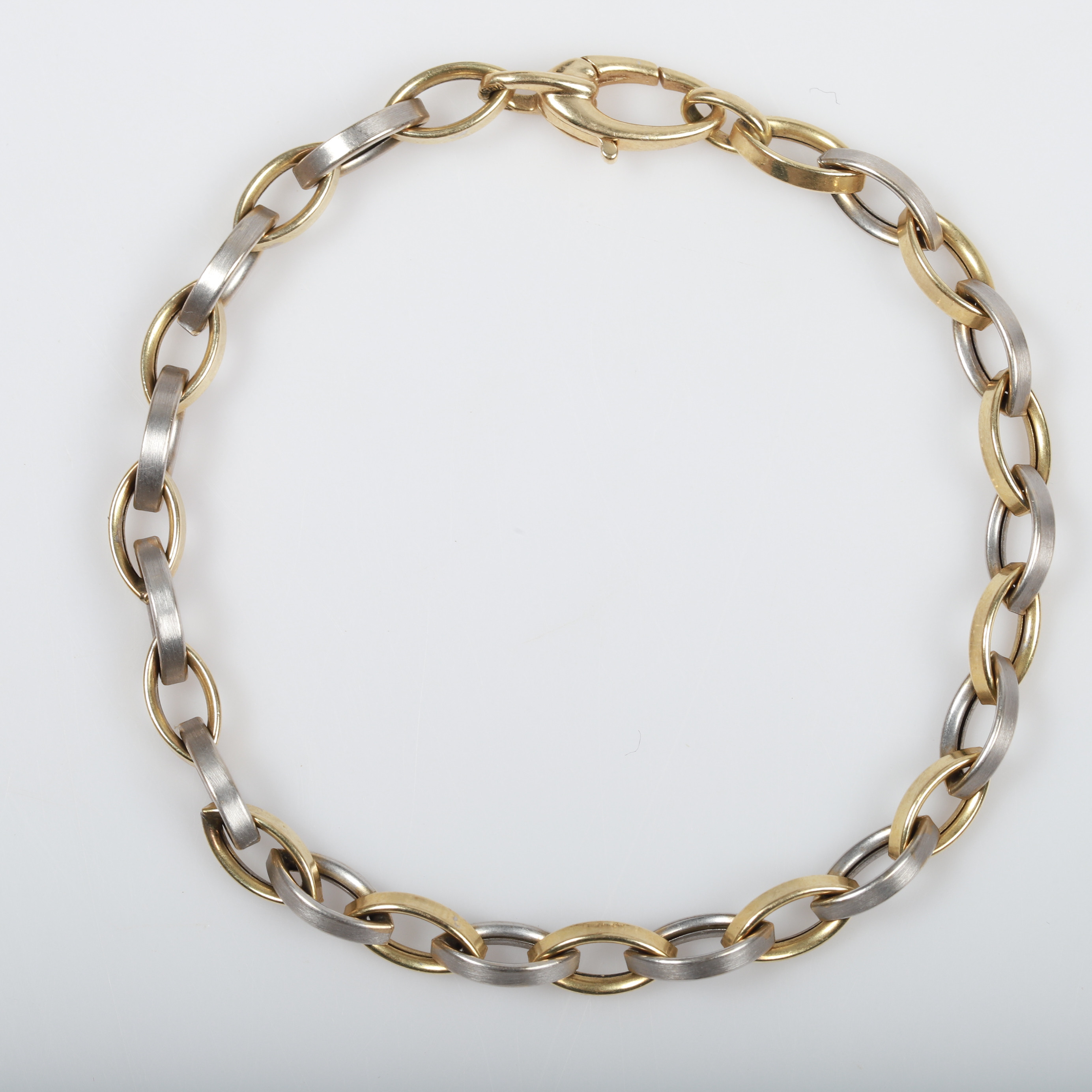 ARMBAND, tvåfärgat, 18 K guld.