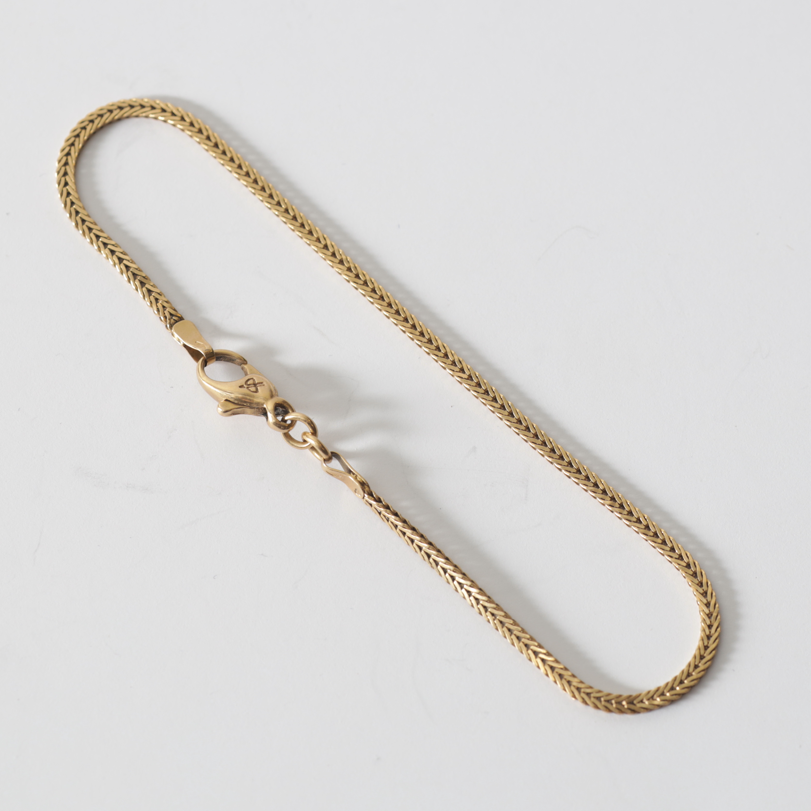 ARMBAND, 18K guld. Totalvikt ca 3,5 gram.