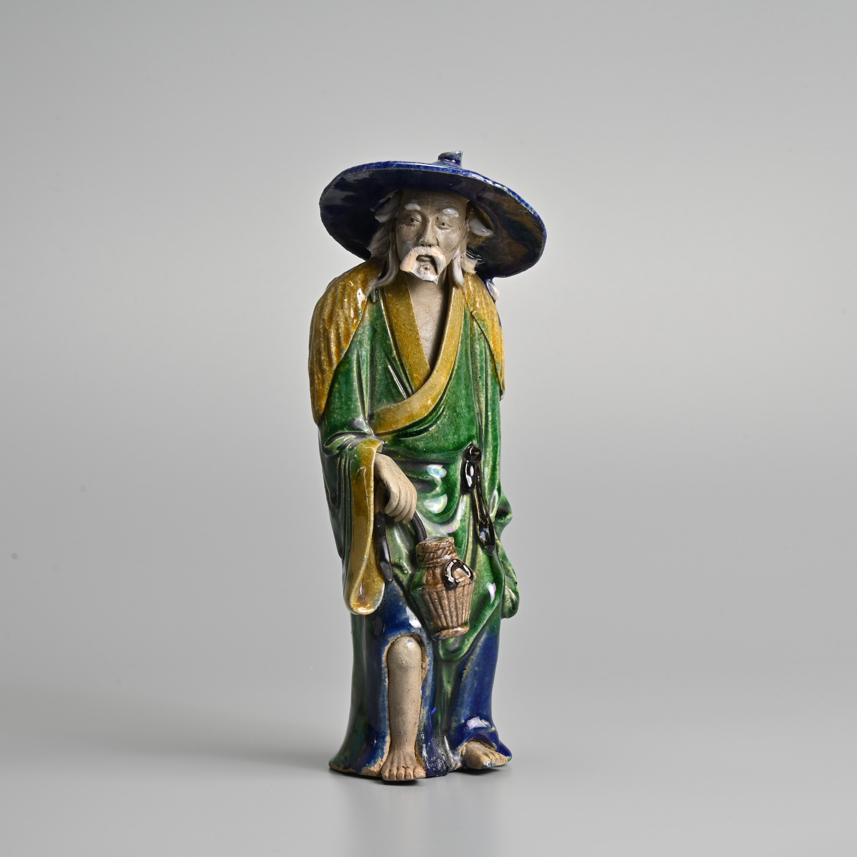 A CHINESE SHIWAN TYPE 'SANCAI' GLAZED CERAMIC FIGURE, REPUBLIC PERIOD.