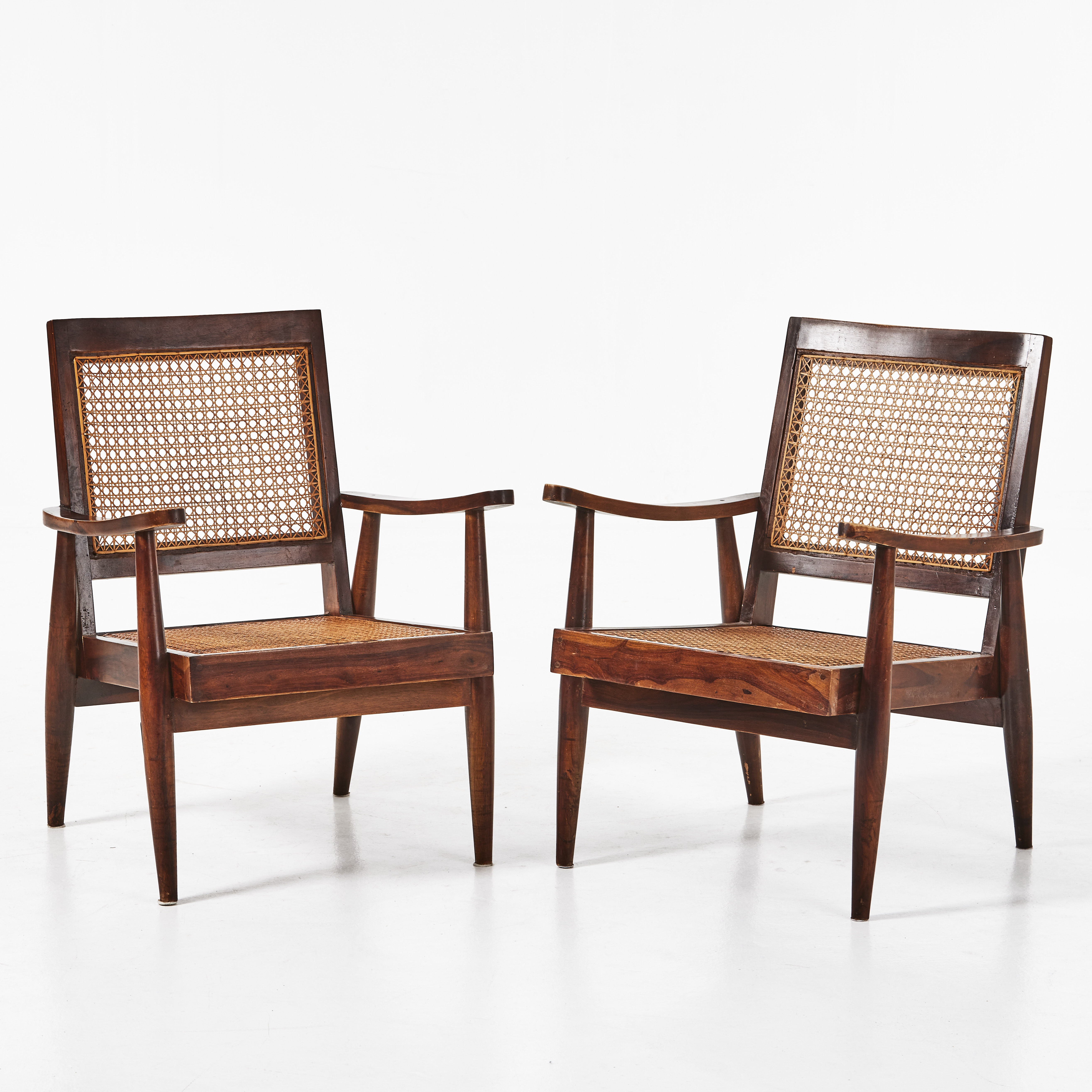 FÅTÖLJER, 1 par, enligt uppgift inköpta på ROOM, mörkbetsade, sits och rygg i rotting.