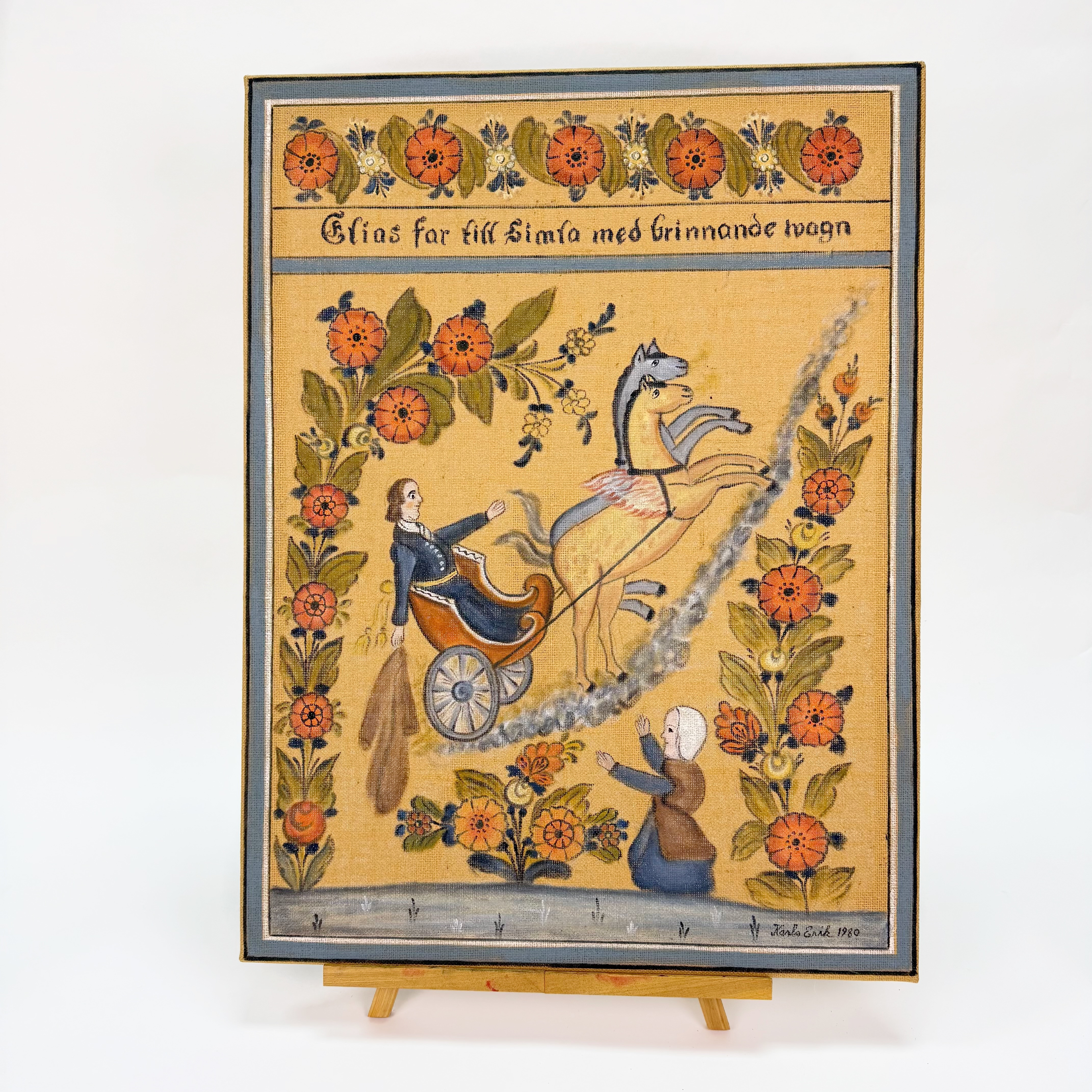 KARLS ERIK. KURBITS på textil, - Elias far till himla med brinnandevagn- signerad och daterad 1980.