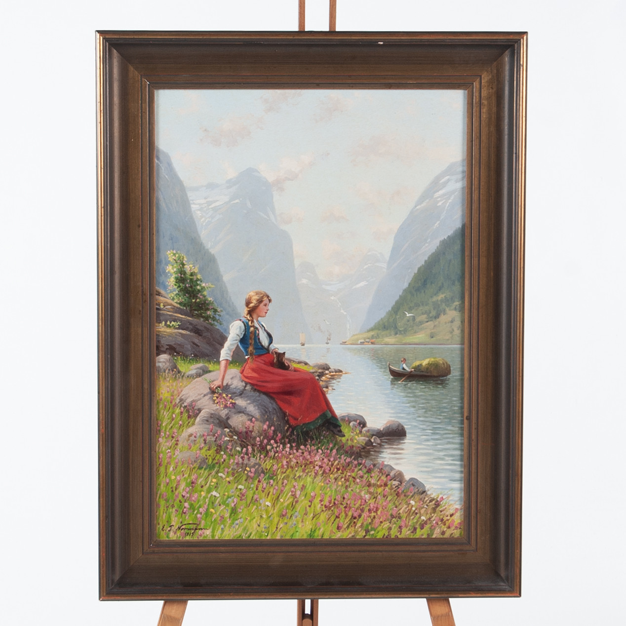 EMMA PASTOR NORMANN. Olja på duk, Fjällandskap med flicka vid fjord. Signerad och daterad 1915.