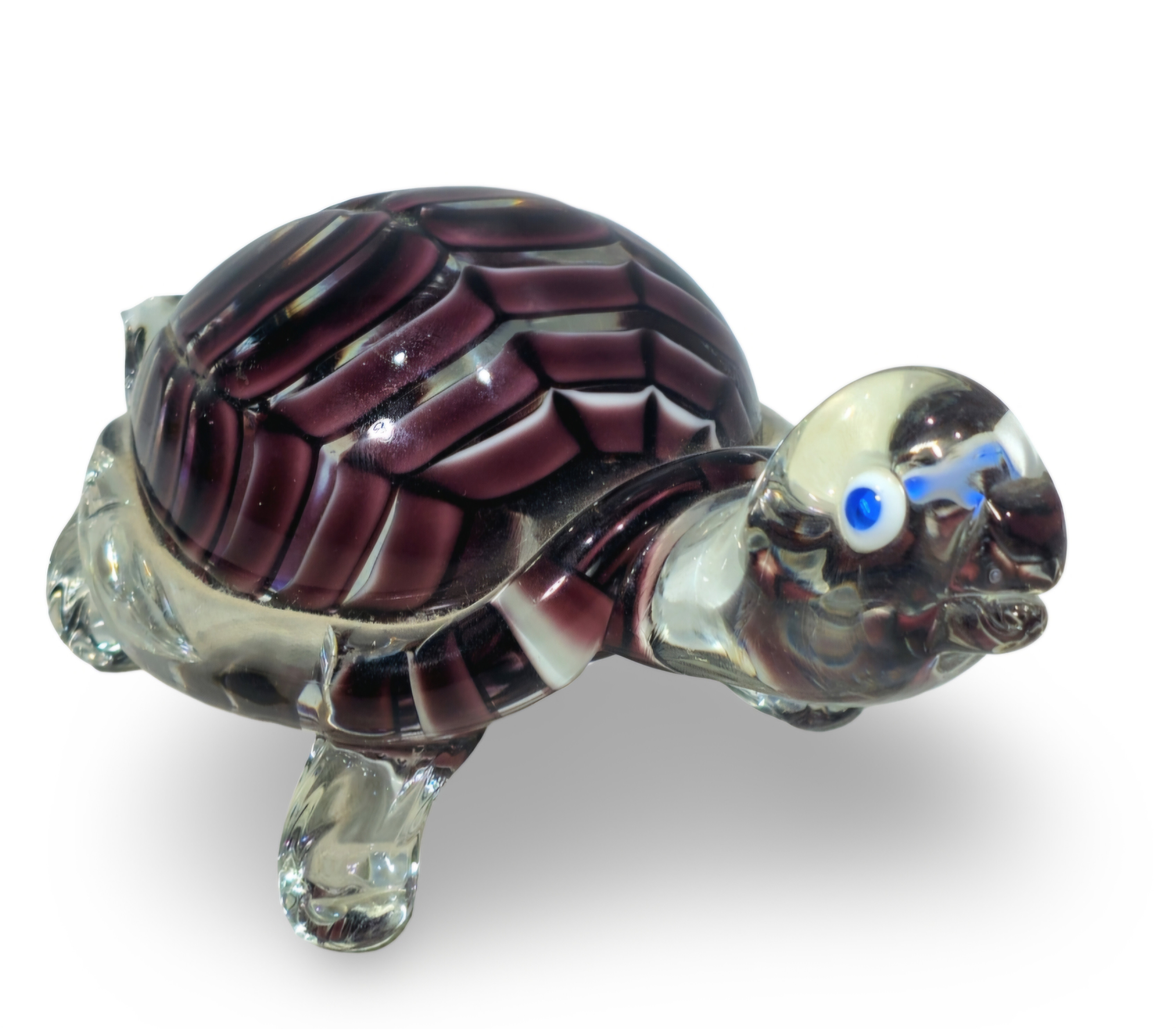 Figura de tortuga en cristal de Murano en tonos violetas y morados.