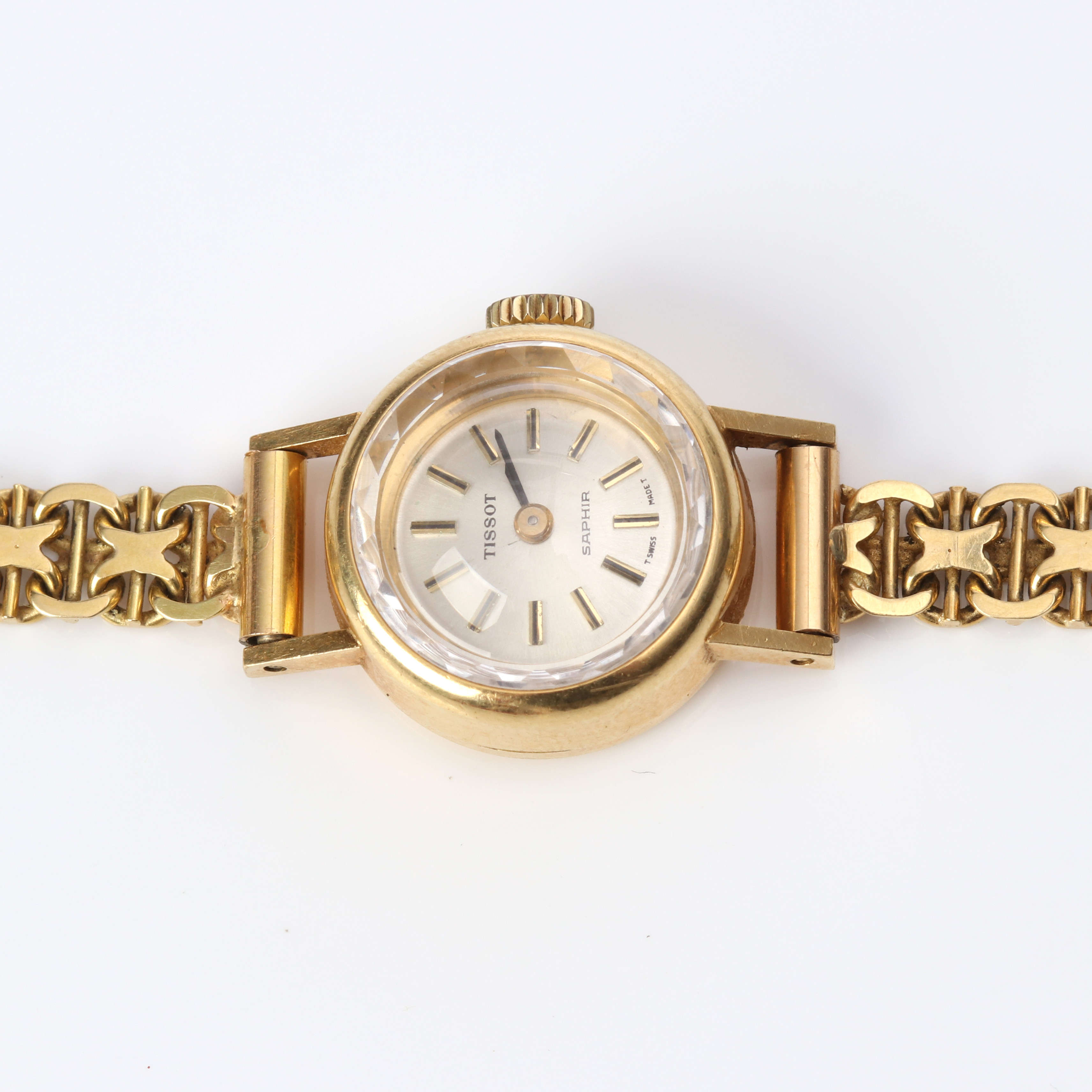 TISSOT, DAMARMBANDSUR. 18k guld i boett och länk, totalvikt ca 20,0 gram.