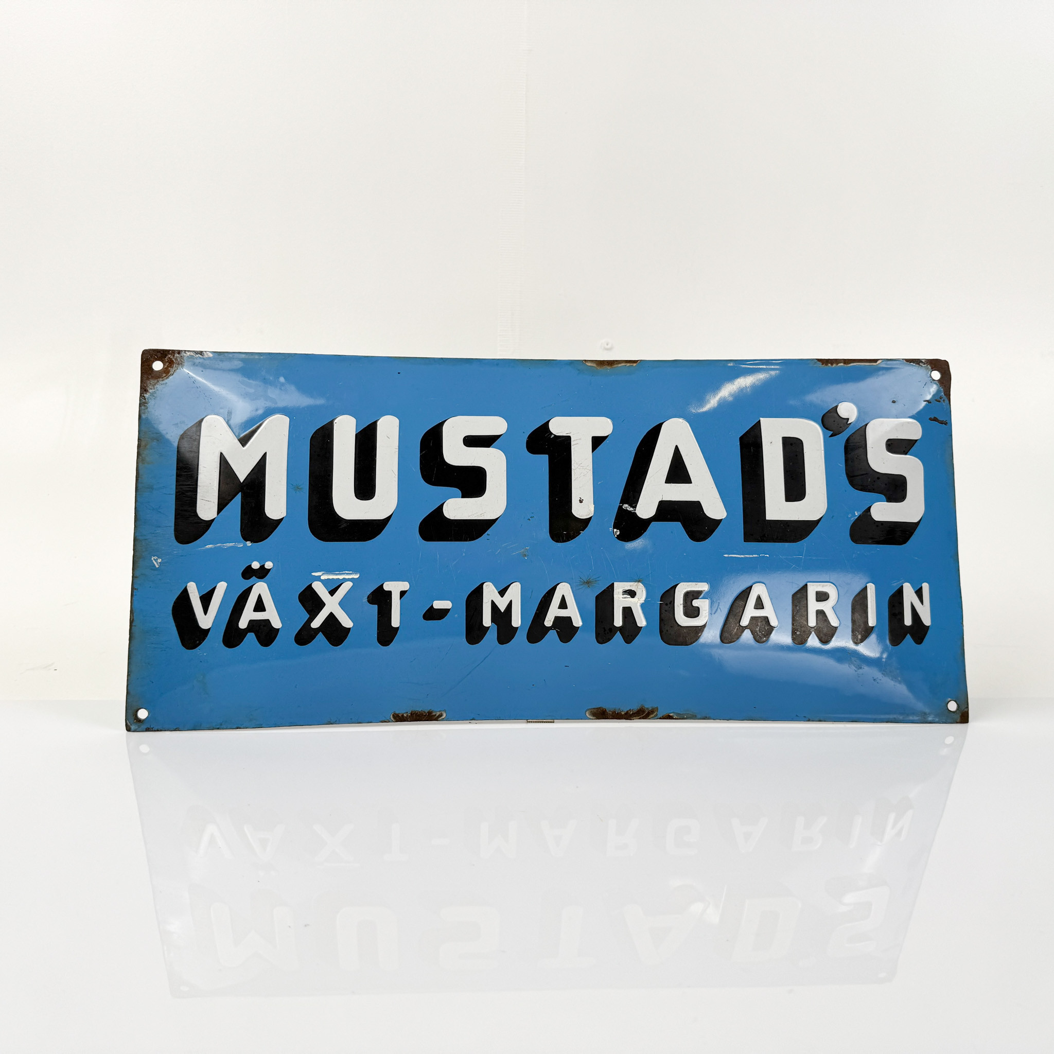 MUSTAD´S, emaljskylt, 1920/30-tal.
