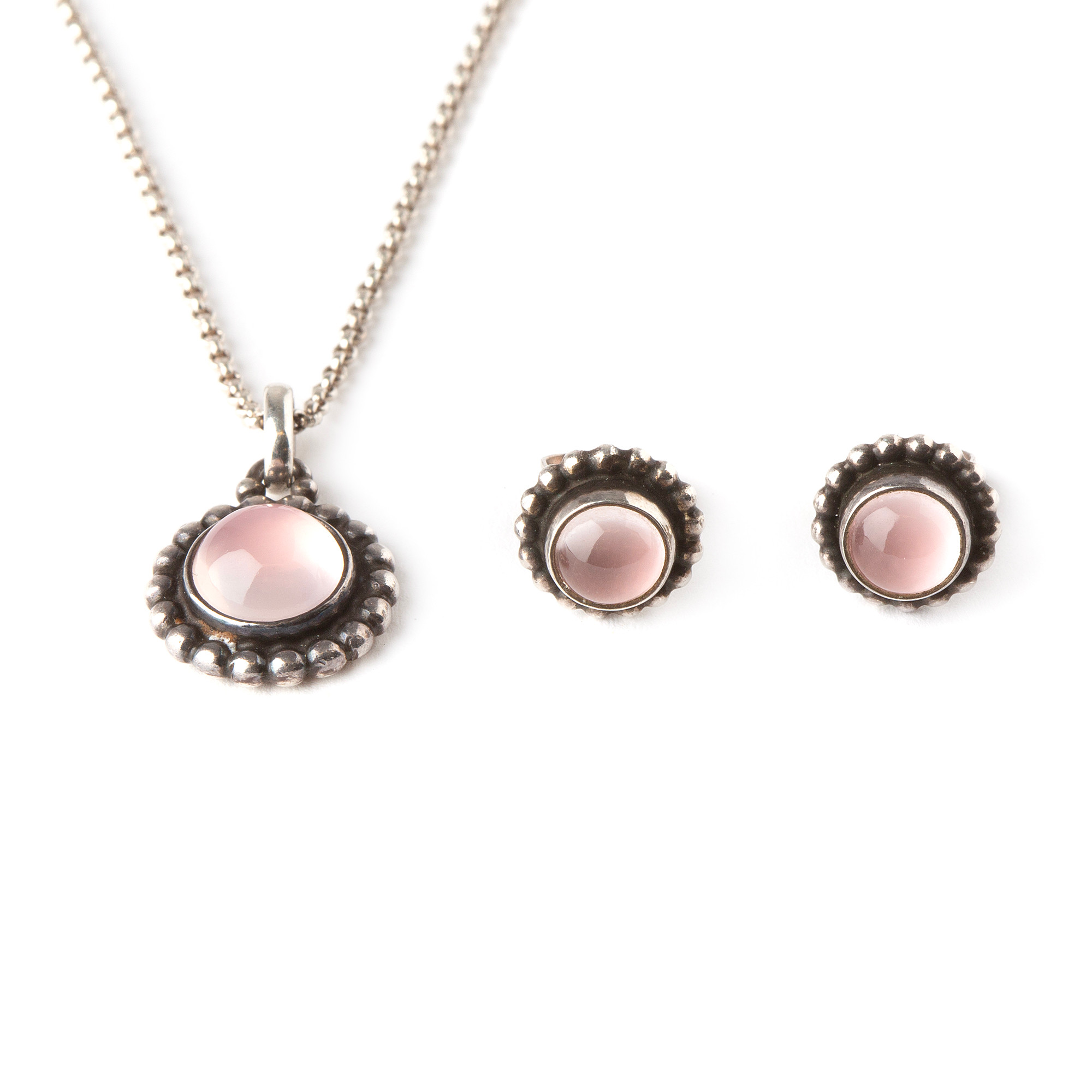 GEORG JENSEN, hänge samt örhängen, "Moonlight Blossom", cabochonslipad rosenkvarts, design no 9A respektive 9.