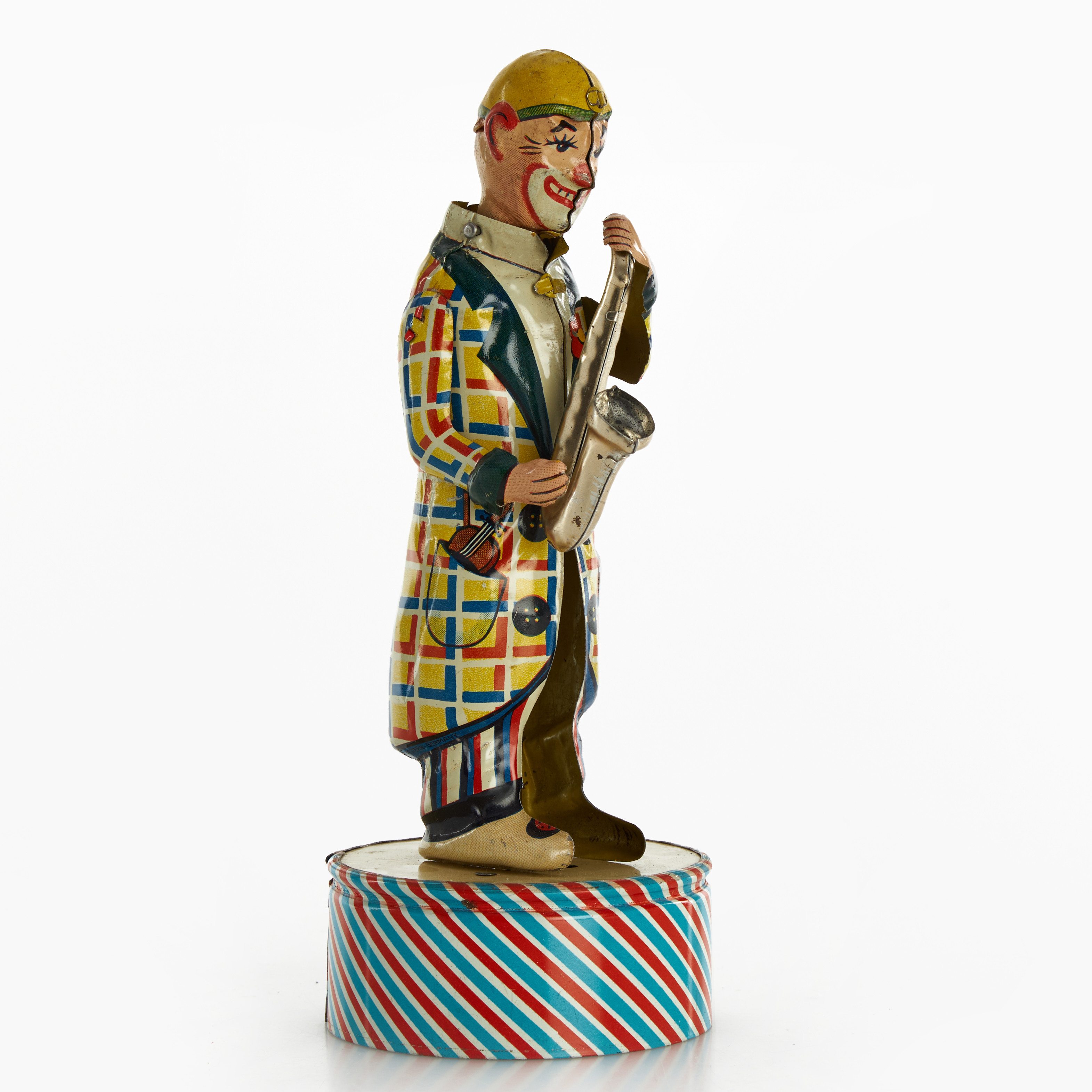 DISTLER. Plåtleksak, musicerande clown, Tyskland, litograferad plåt, urverk med speldosa.