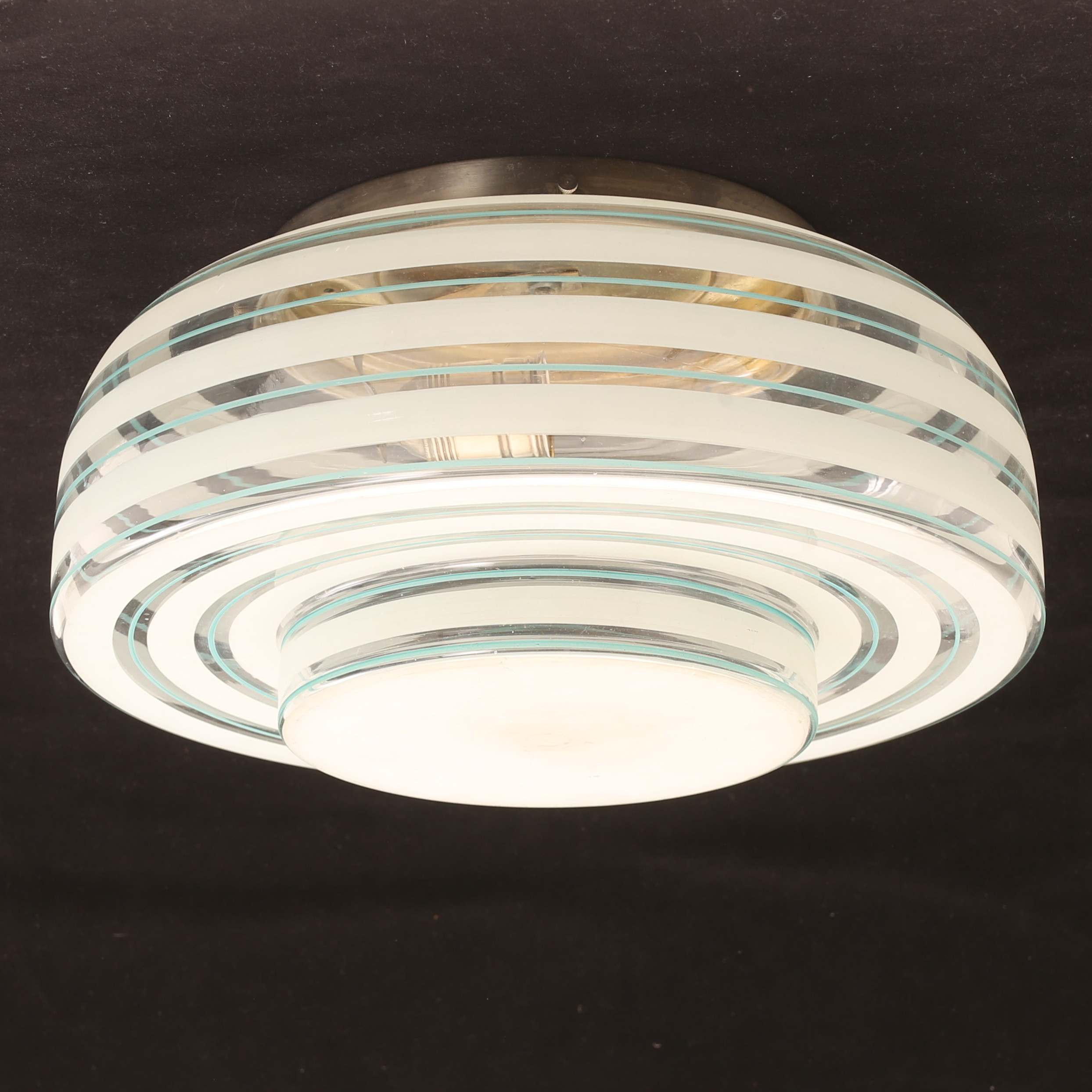 TAKLAMPA, 1900-talets mitt.