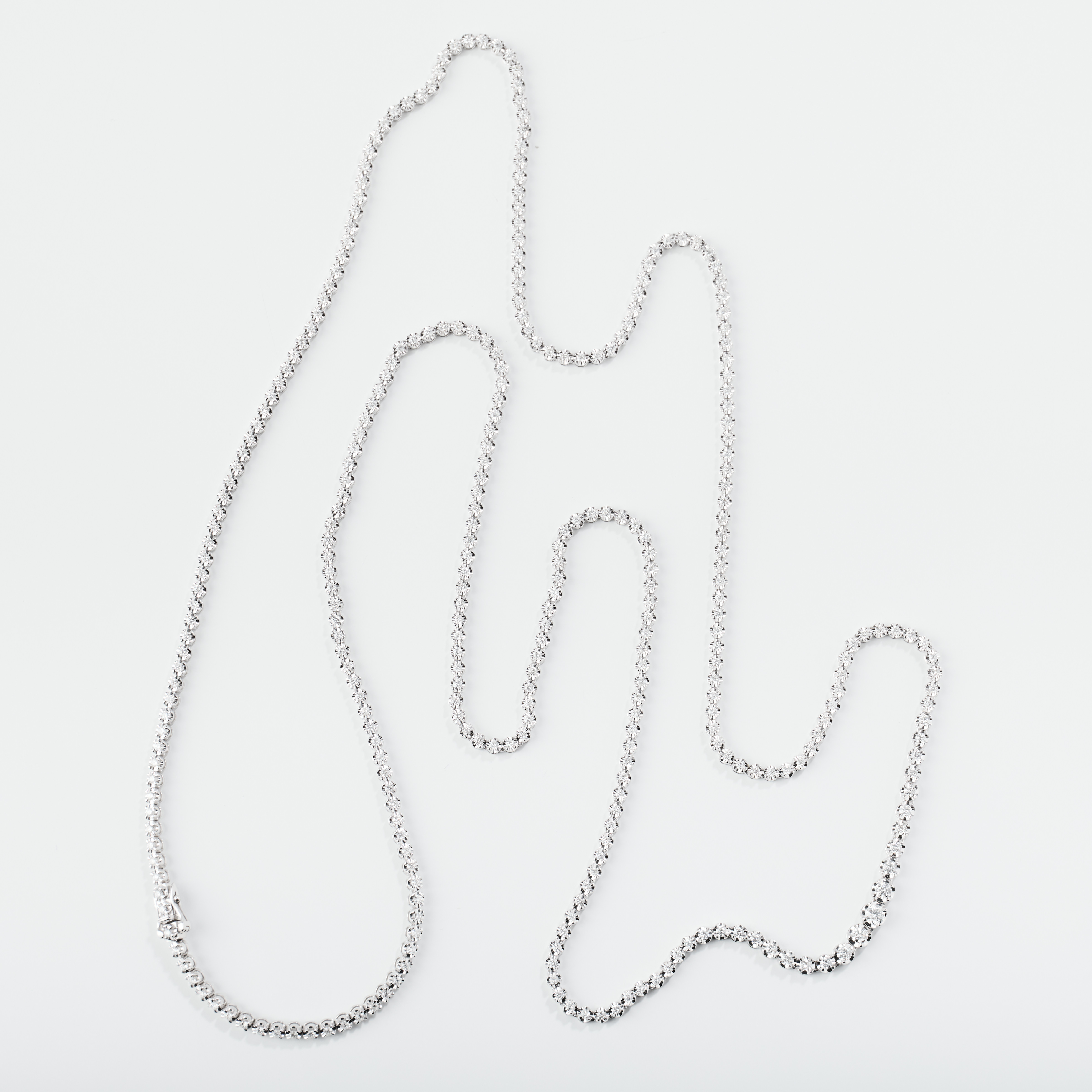 RIVIÈRE, 18K vitguld med diamanter.