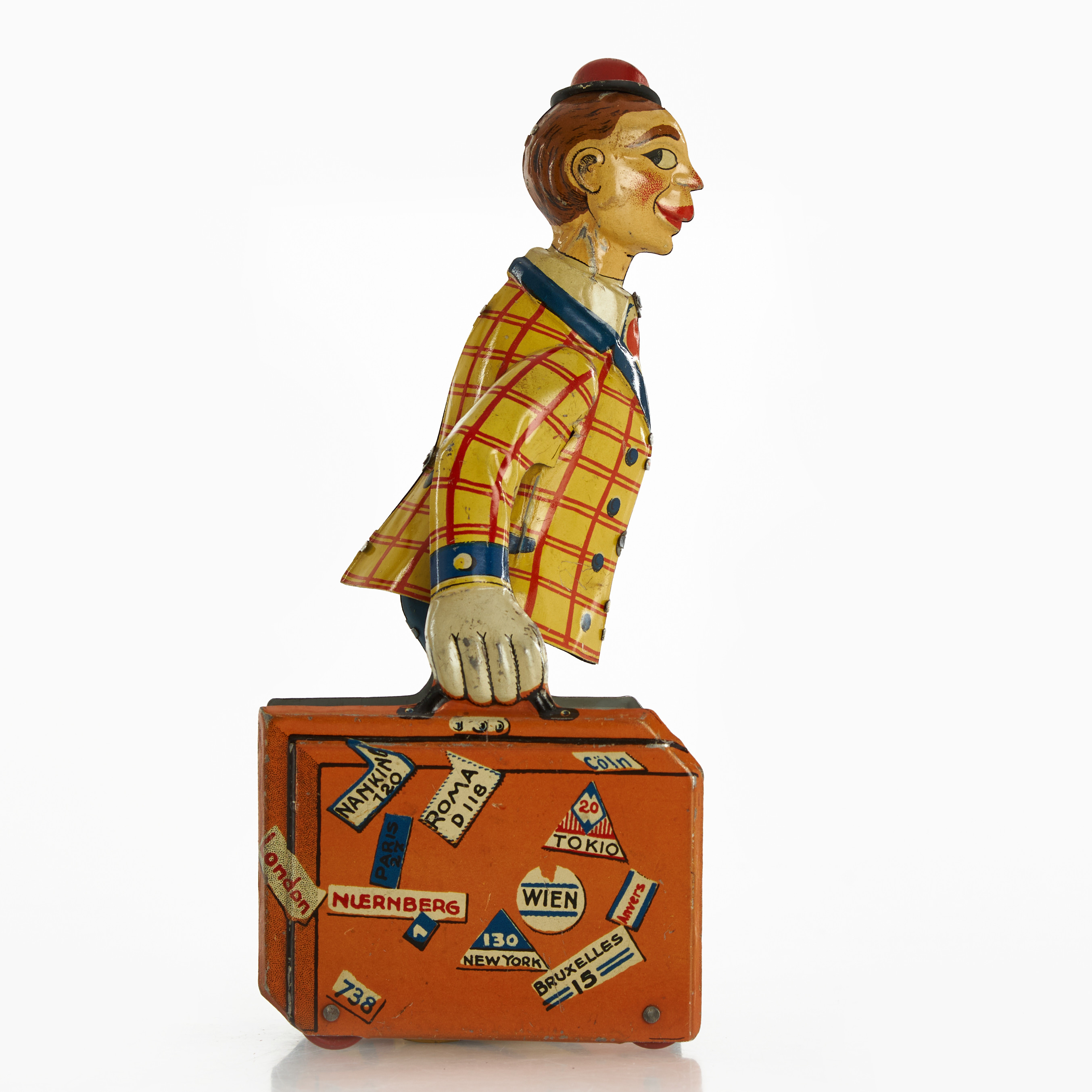 DISTLER. Plåtleksak, man med resväskor, Tyskland, 1920/30-tal, litograferad plåt, urverk.