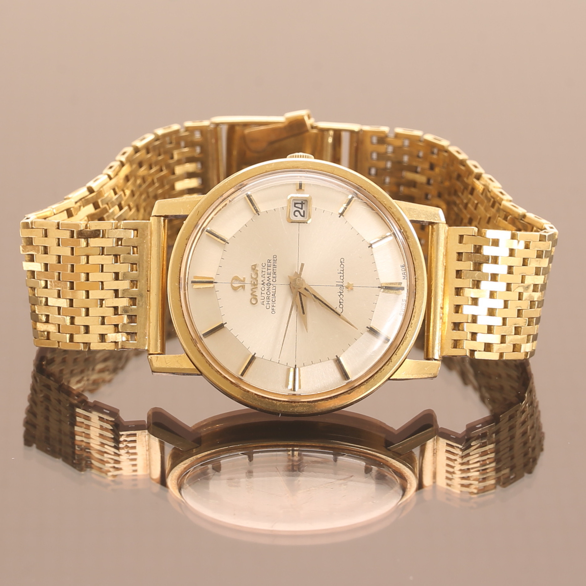 HERRARMBANDSUR, 18 k guld, Omega Constellation Pie-Pan.