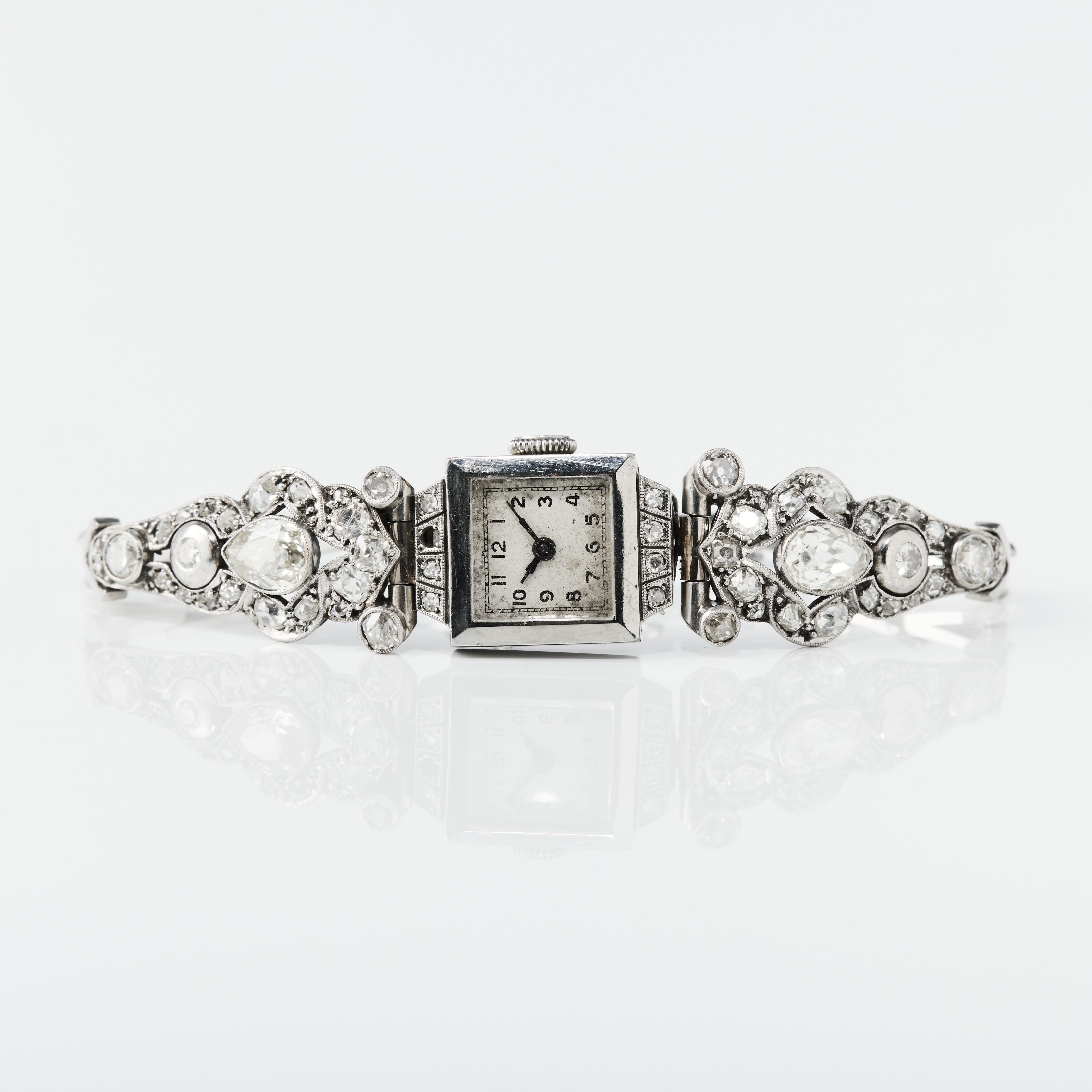 COCKTAILARMBANDSUR, 14K vitguld med diamanter, manuell, ateljéur, Art Deco 1920/30-tal.