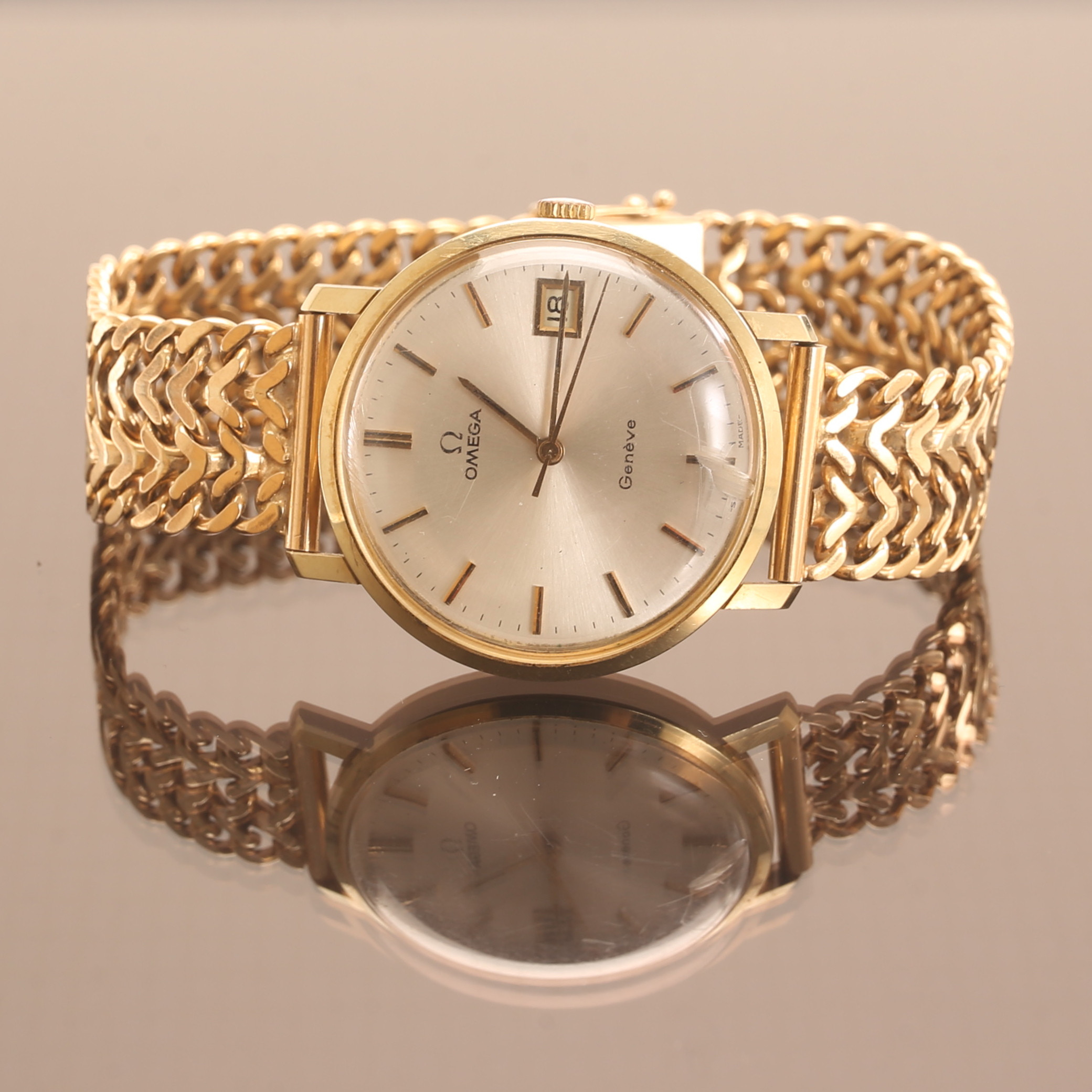 HERRARMBANDSUR, Omega, 18 k guld.