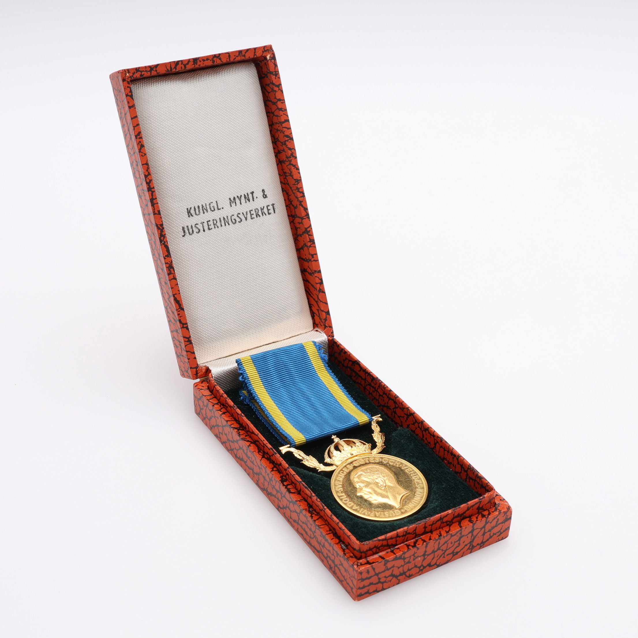 FÖRTJÄNSTMEDALJ/NOR, 23 och 18 k guld, totalt 13,3 g.