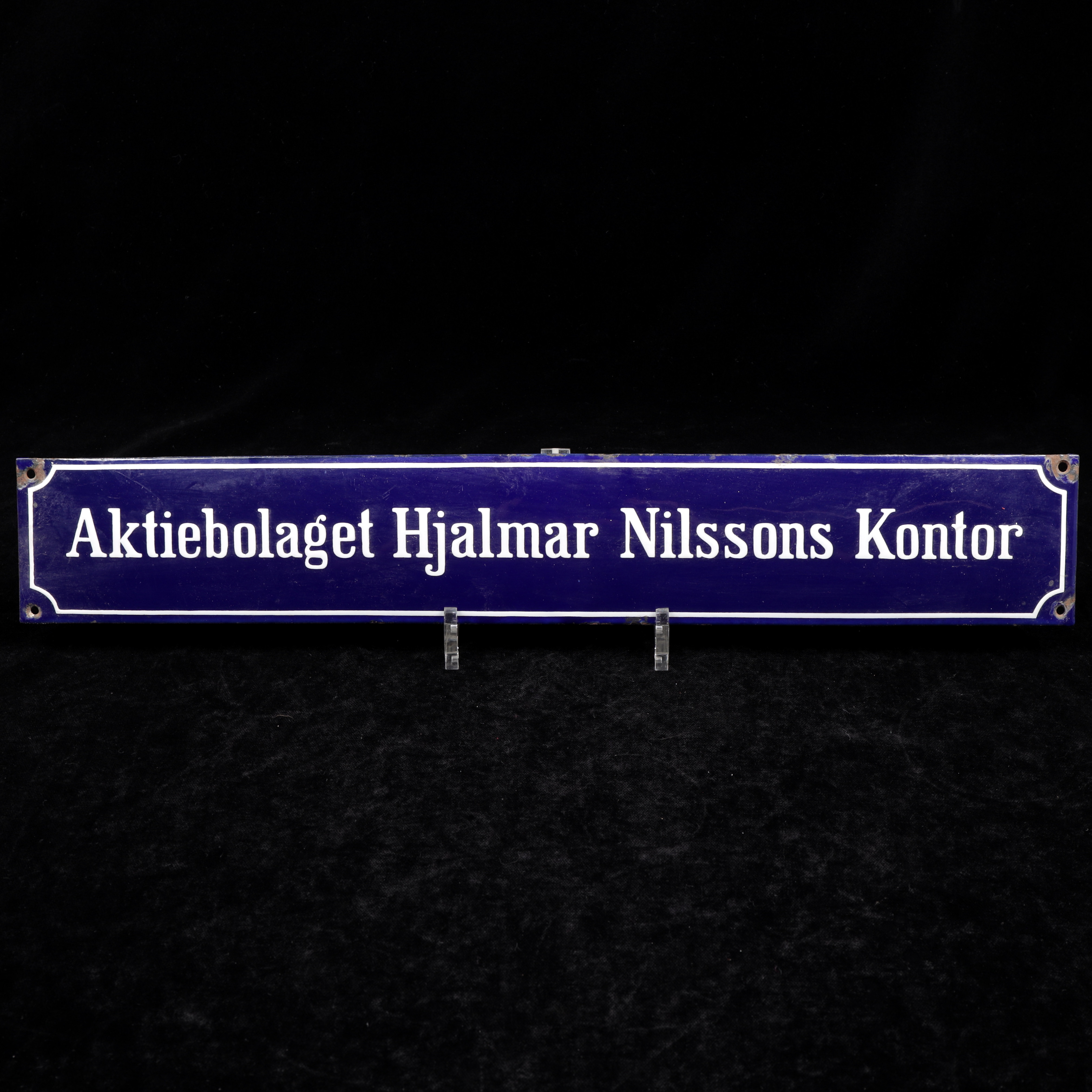 EMALJERAD SKYLT, Aktiebolaget Hjalmar Nilssons Kontor.