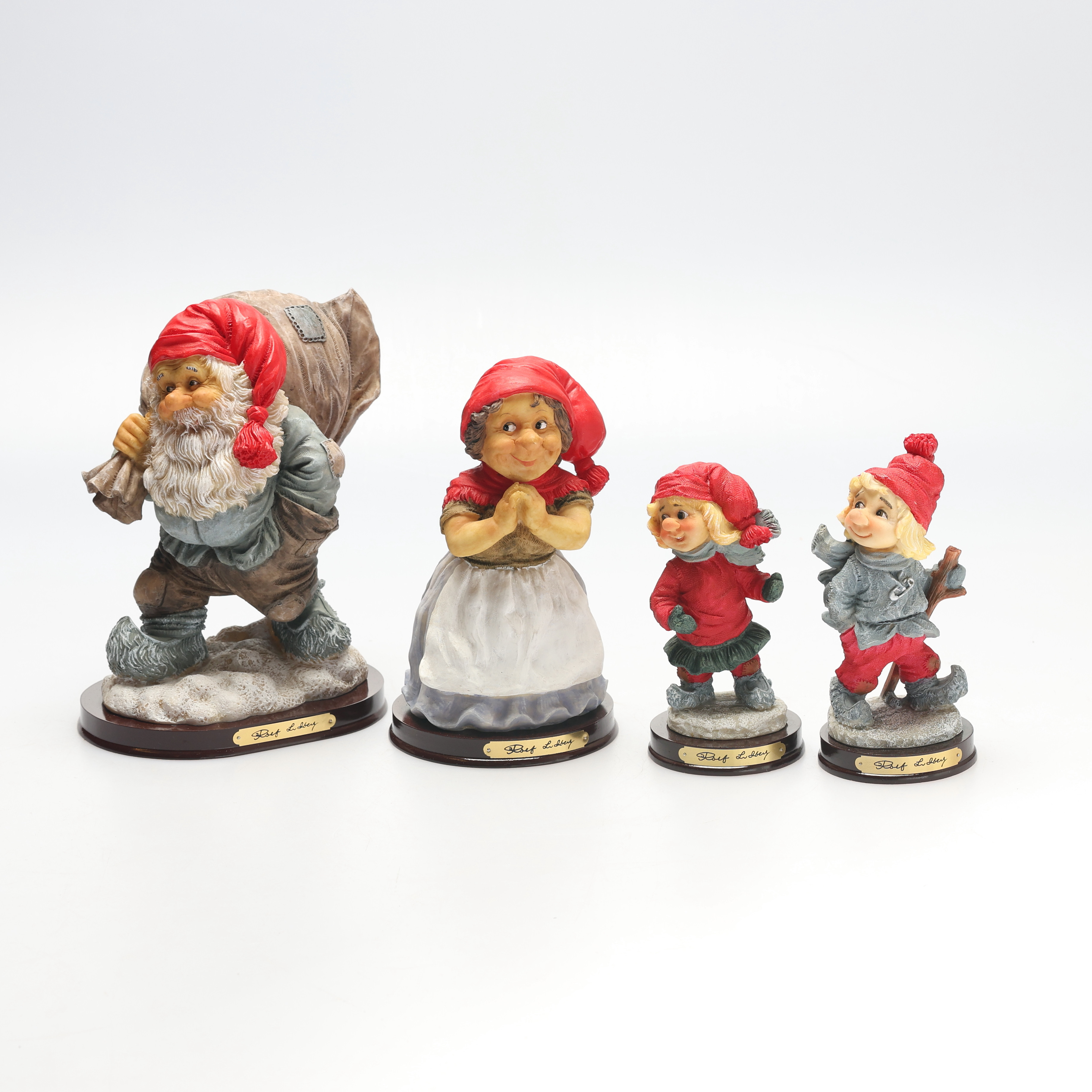 ROLF LIDBERG. Skulpturer, 4 st, tomtar, konstmasssa, RBA Olofström, etikettmärkta.