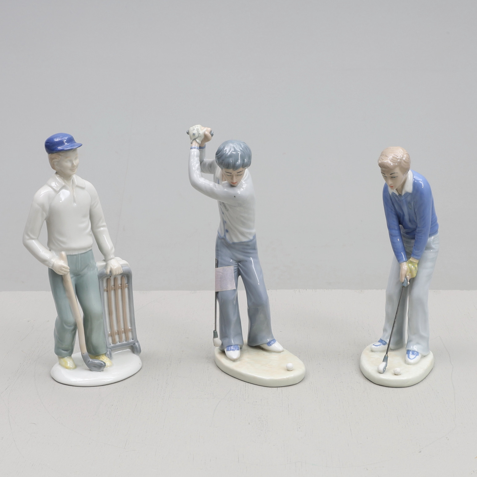 FIGURINER, 3 st, porslin, golfspelare, Casades/GDR, Spanien & Tyskland.