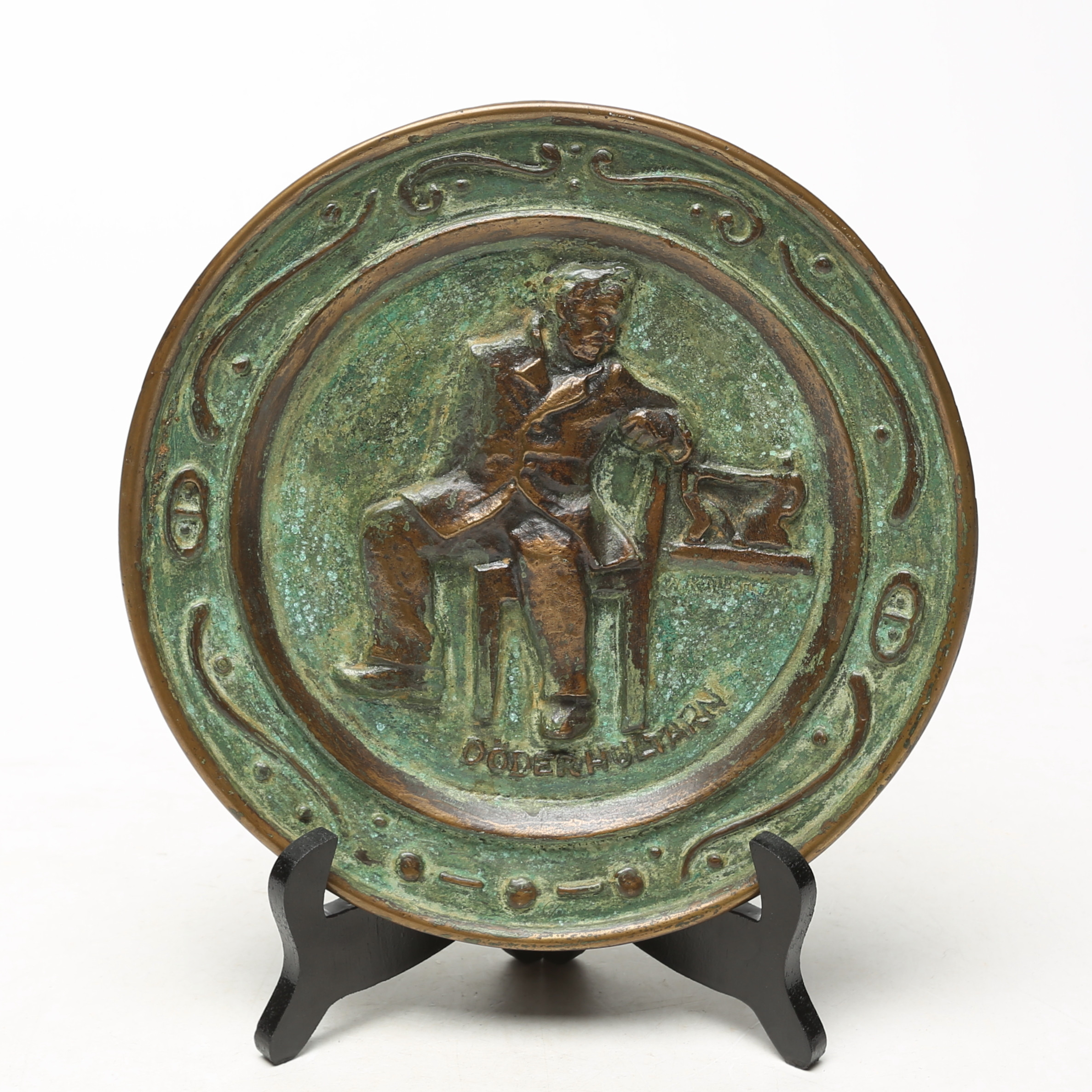 FAT, brons, föreställande Döderhultarn.