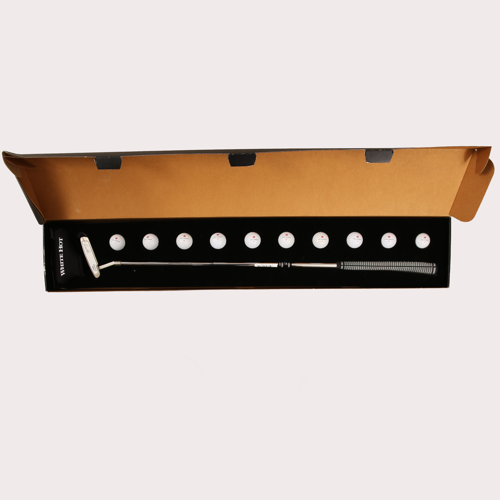 ARNOLD PALMER. Gofklubba Putter, "White Hot" trycksignerad, med 10 golfbollar Callaway i originalkartong.
