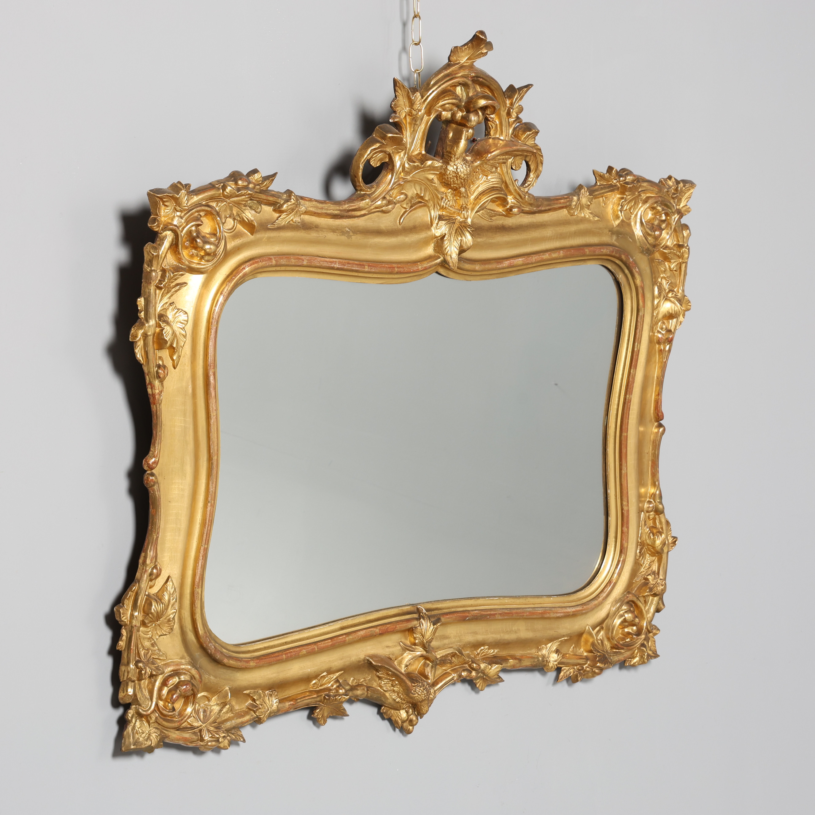 SPEGEL, nyrokoko, 1800-talets andra hälft, skuren dekor, förgylld.