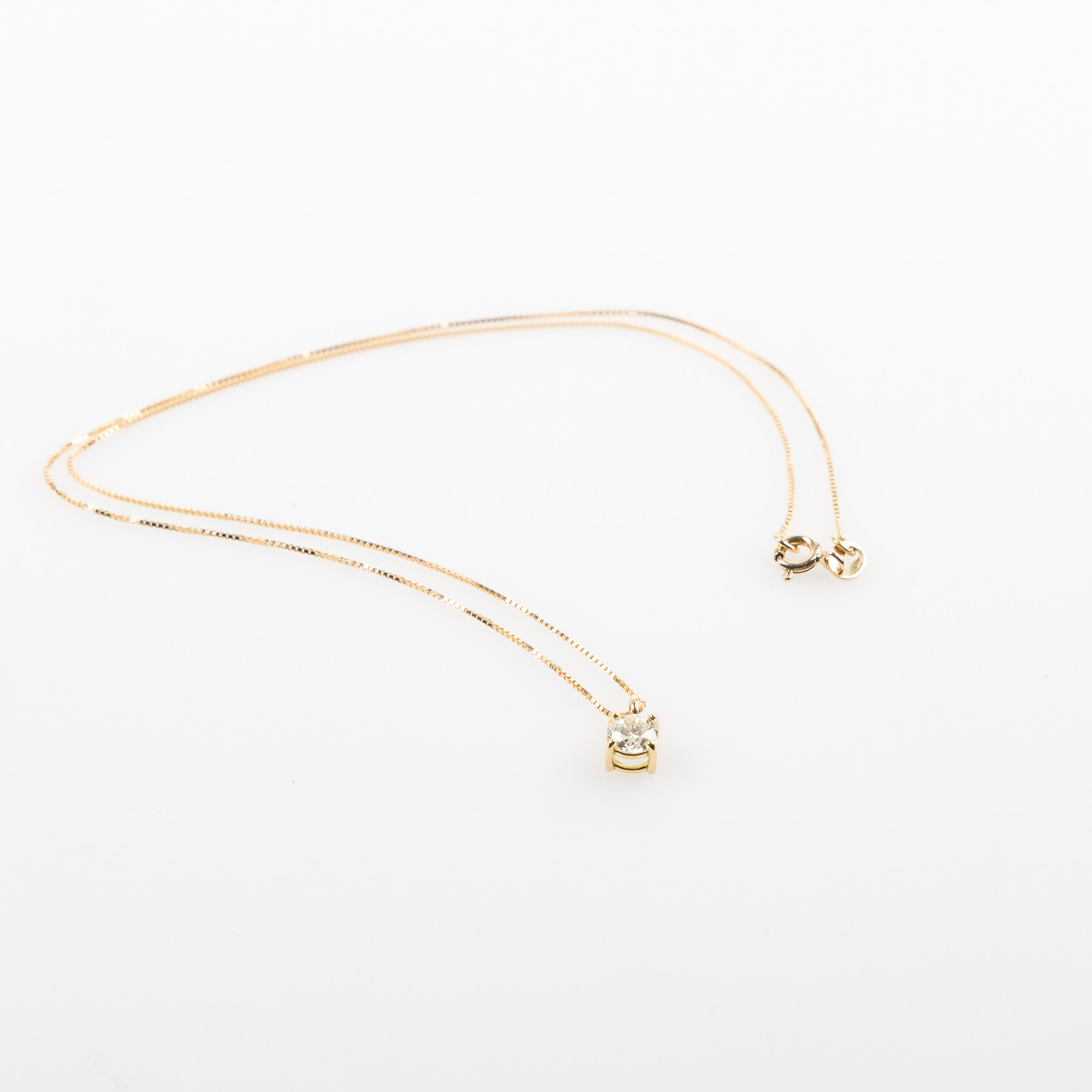 HÄNGE, 18K guld med briljantslipad diamant ca 0.50 ct.