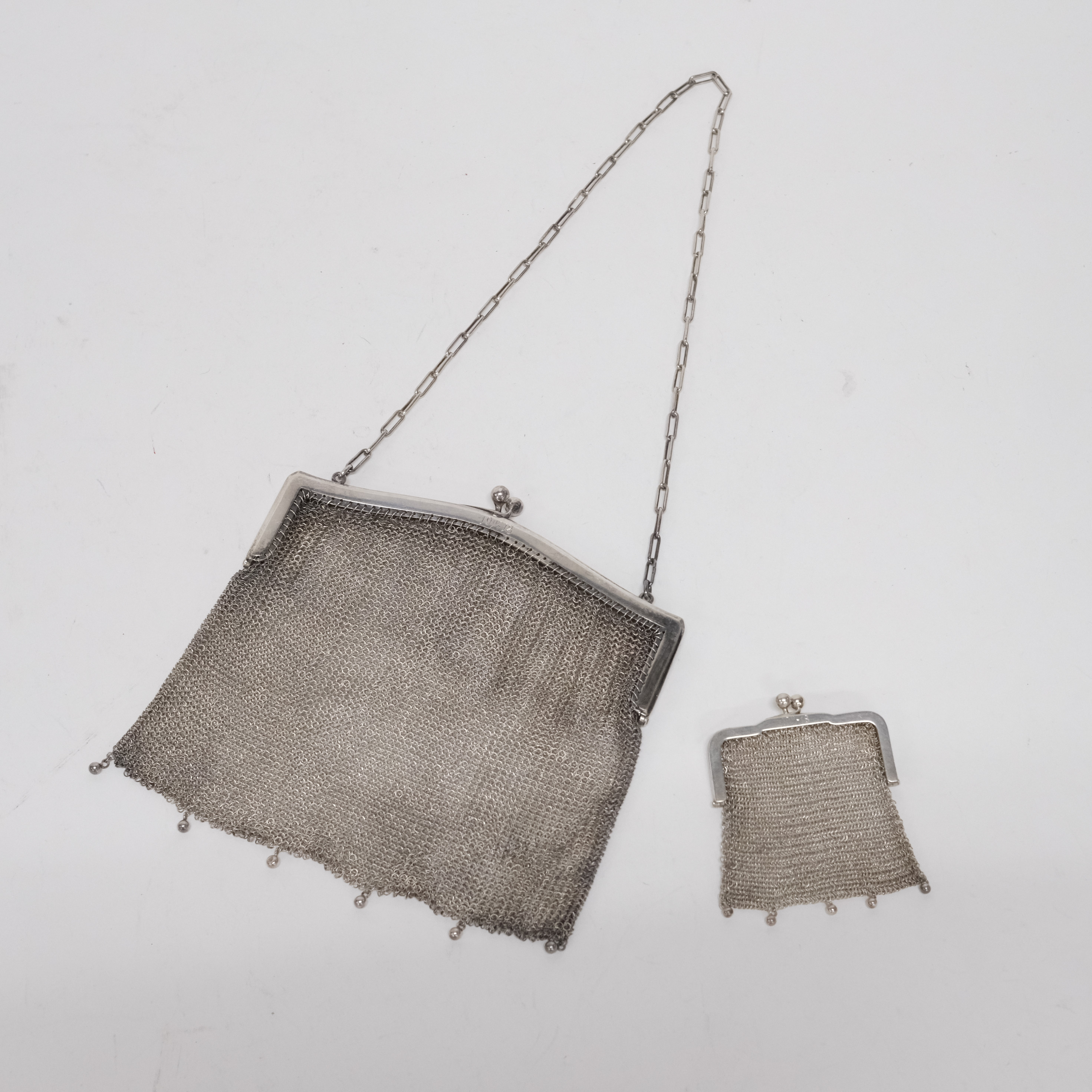 AFTONVÄSKA SAMT PORTMONNÄER, SILVER, 1900-TAL.