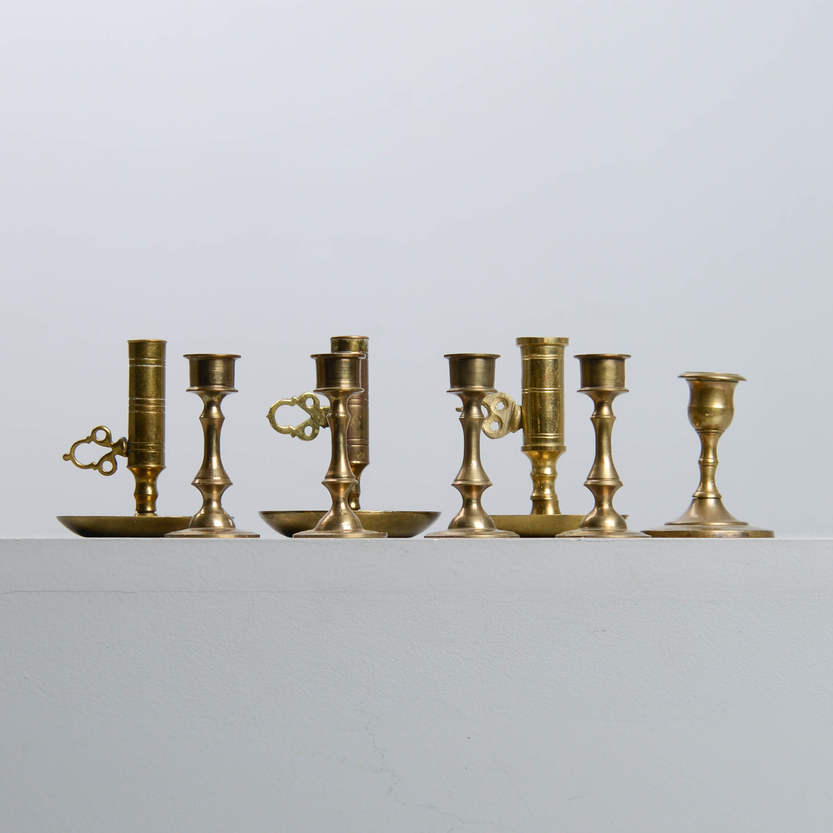 MINIATYRLJUSSTAKAR, 8 st, mässing.