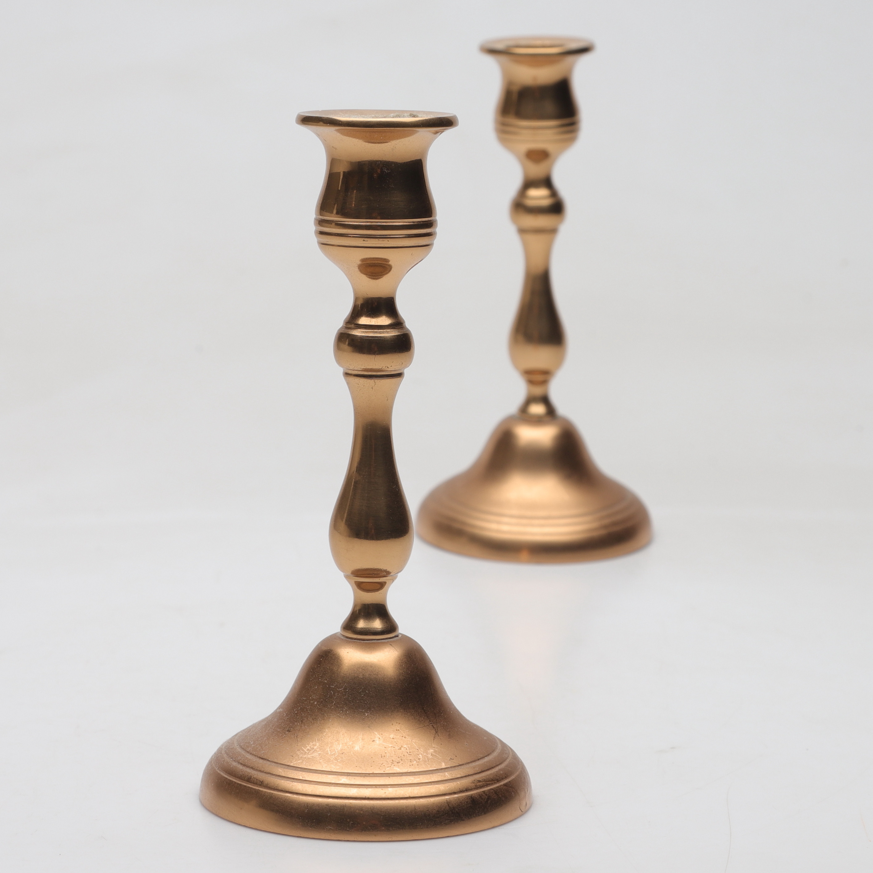 LJUSSTAKAR, ett par, malm, 1900-tal.