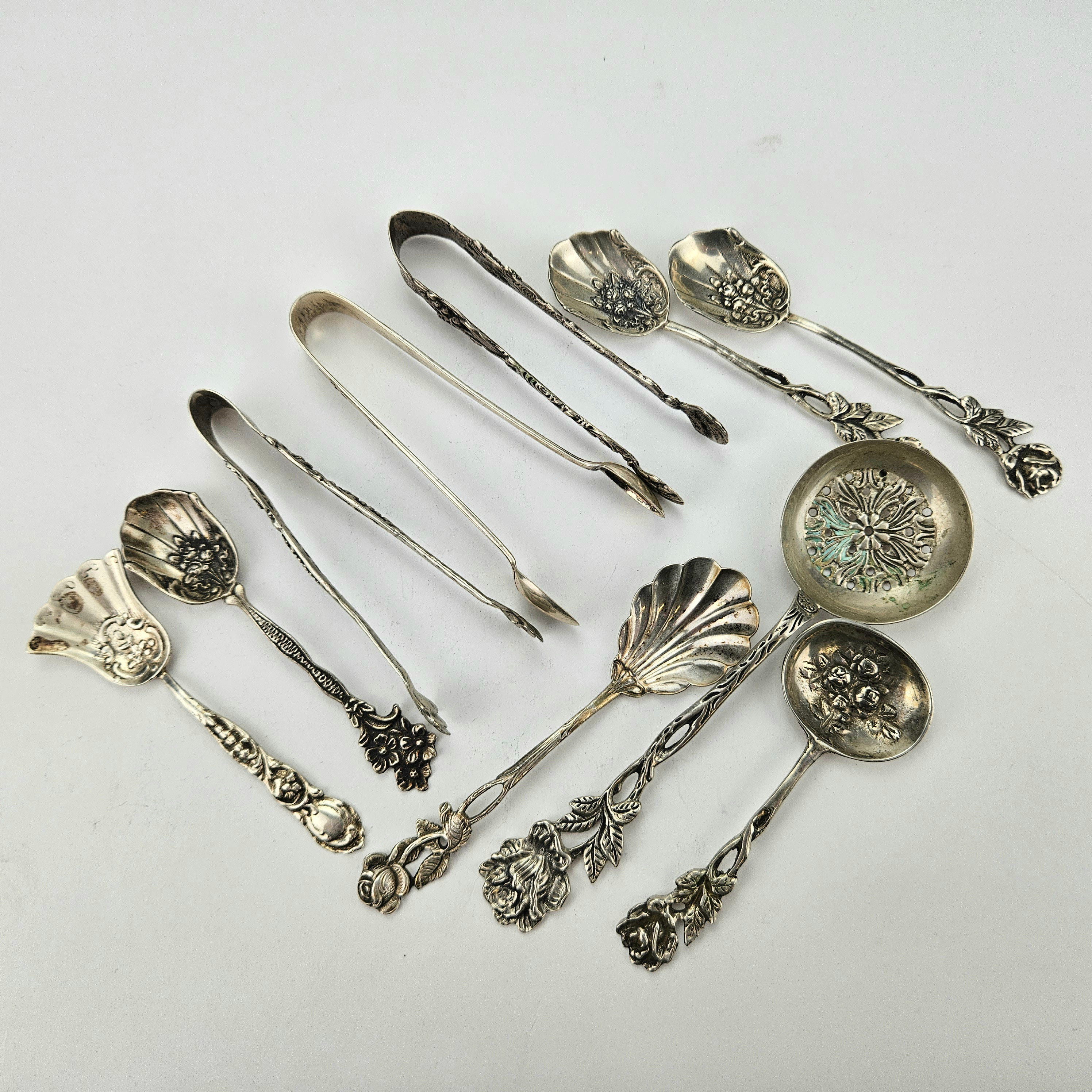 SOCKERSKEDAR OCH SOCKERTÄNGER, 10 delar, silver, vikt ca. 160 gram.