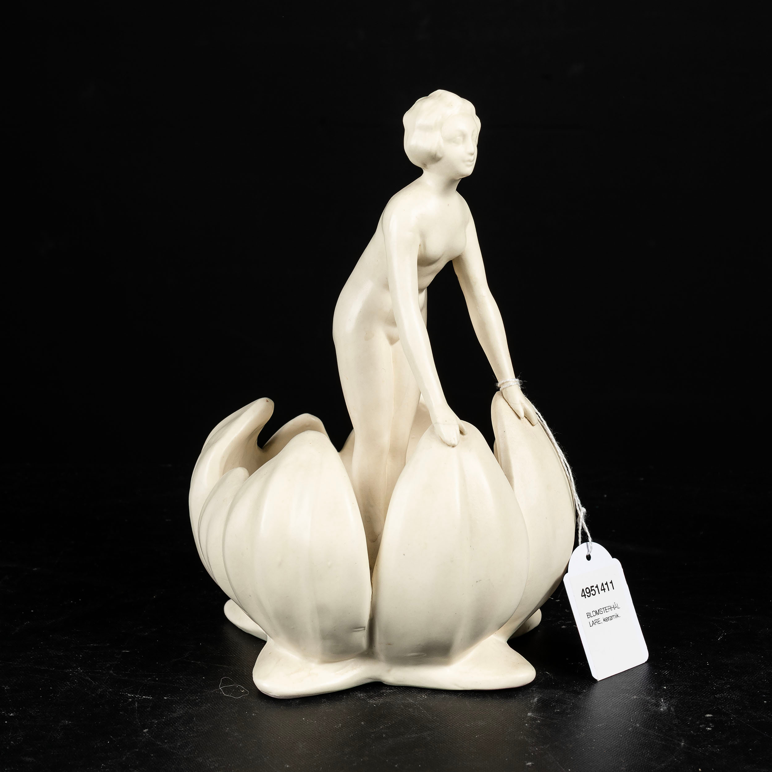 BLOMSTERHÅLLARE, 1900 - talets första hälft.