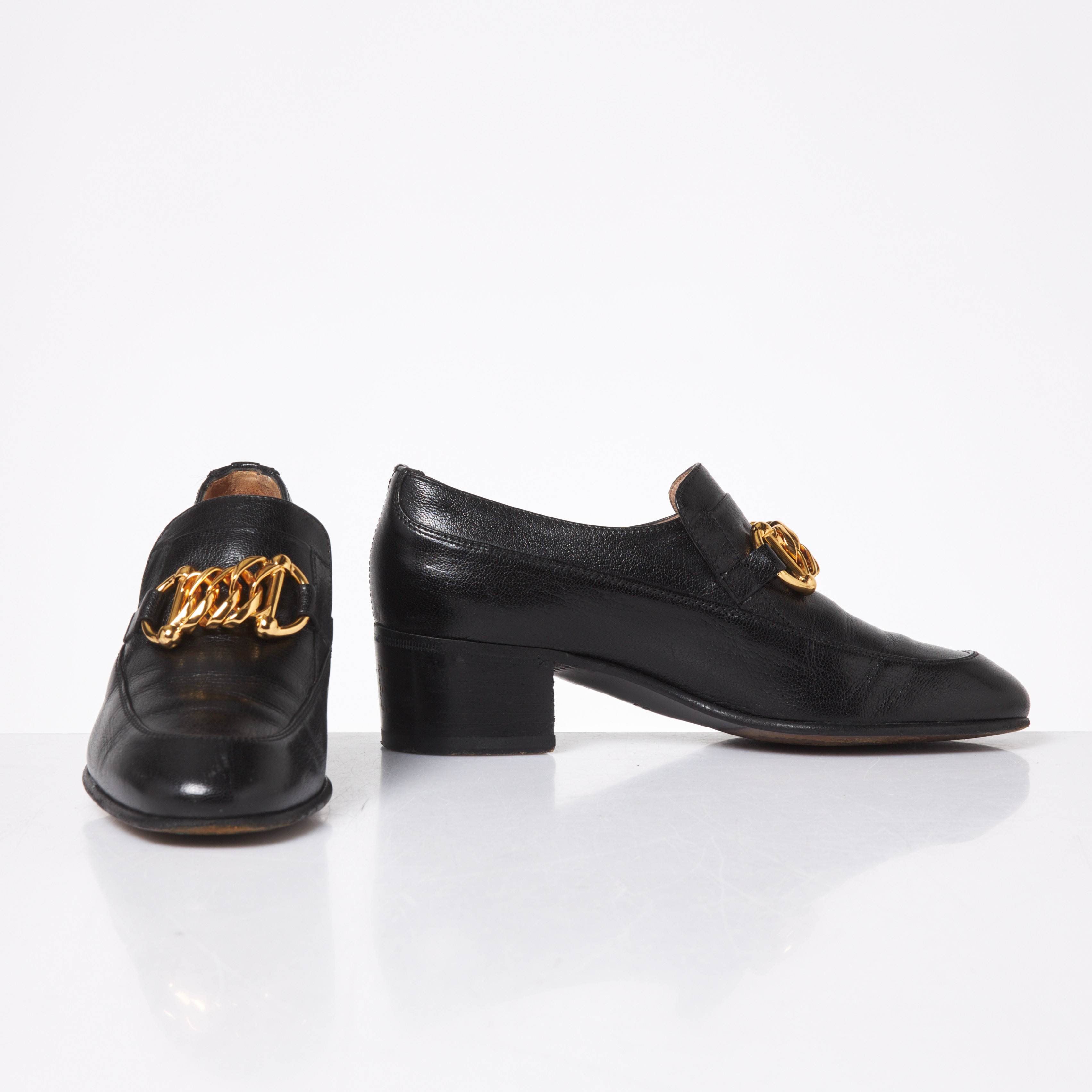 GUCCI. Skor, Ice lolly loafers med klack i svart skinn, text bak på klack ICE LOLLY, storlek 36.