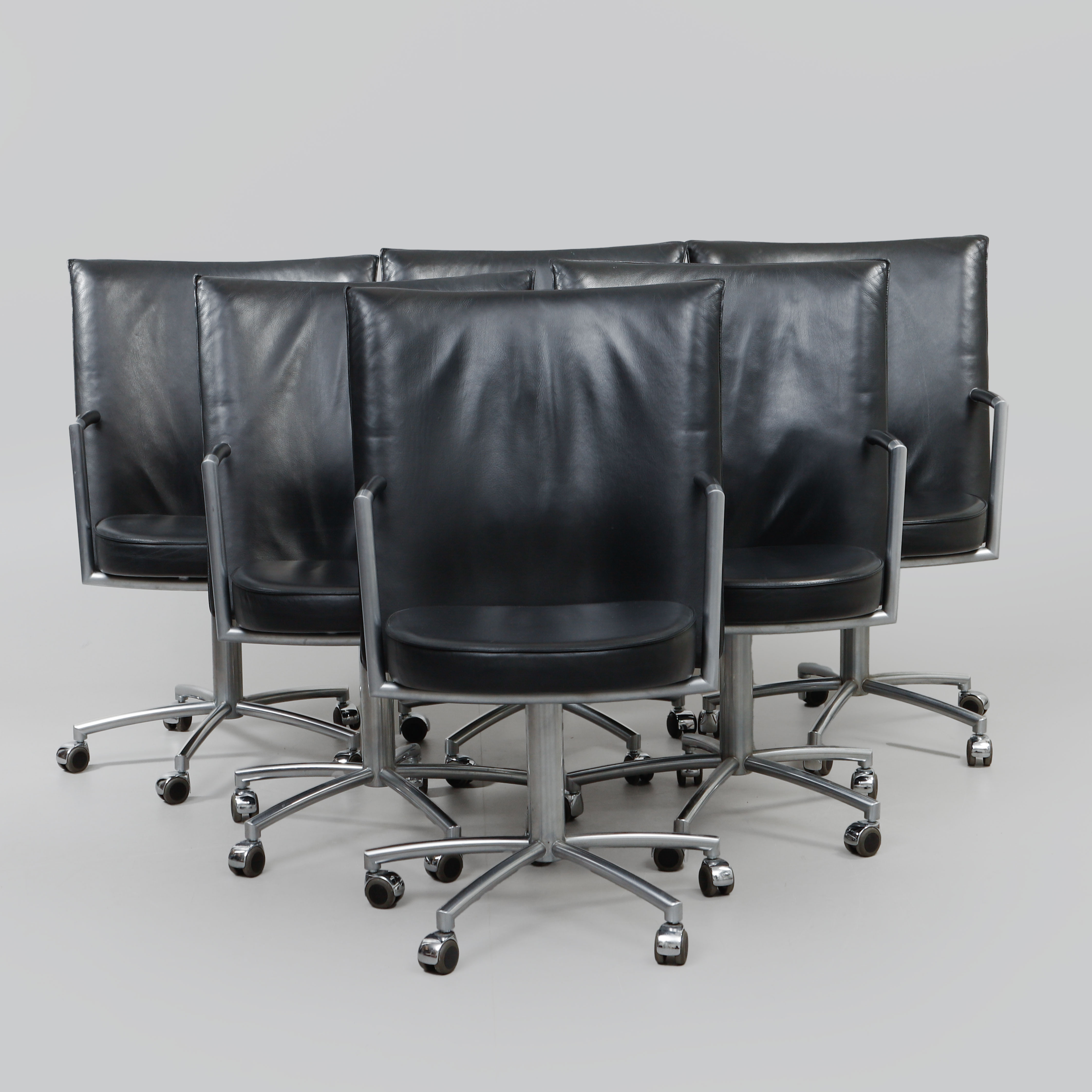 JOHANNES FOERSON & PETER HIORT-LORENZEN. "EJ-70 R Partner", fåtöljer, 8 st Erik Jörgensen, Danmark 1900-talets slut, klädsel svart skinn, stomme i borstad stål.