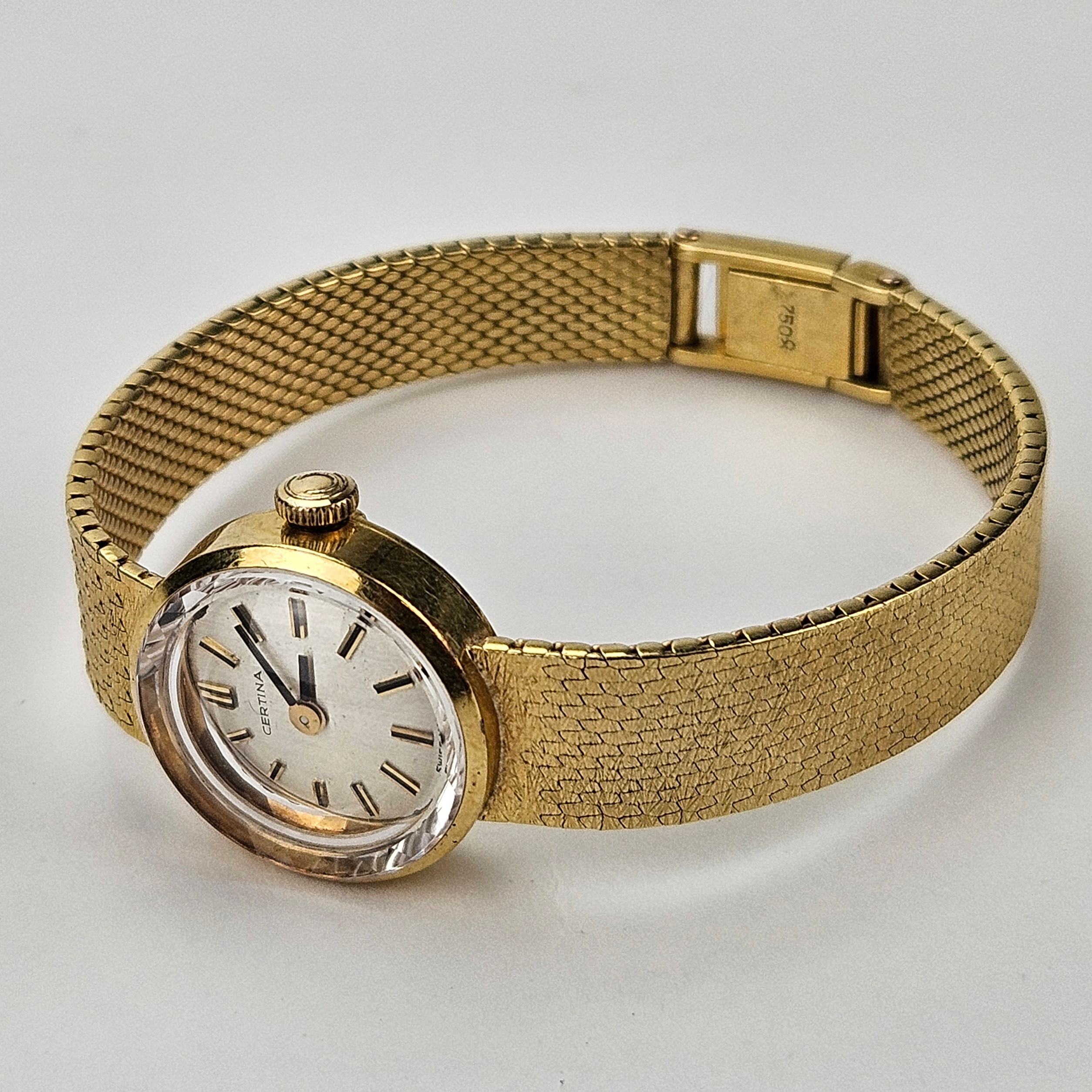 DAMARMBANDSUR, guld, 18K, Certina, total vikt ca. 31,1 gram.