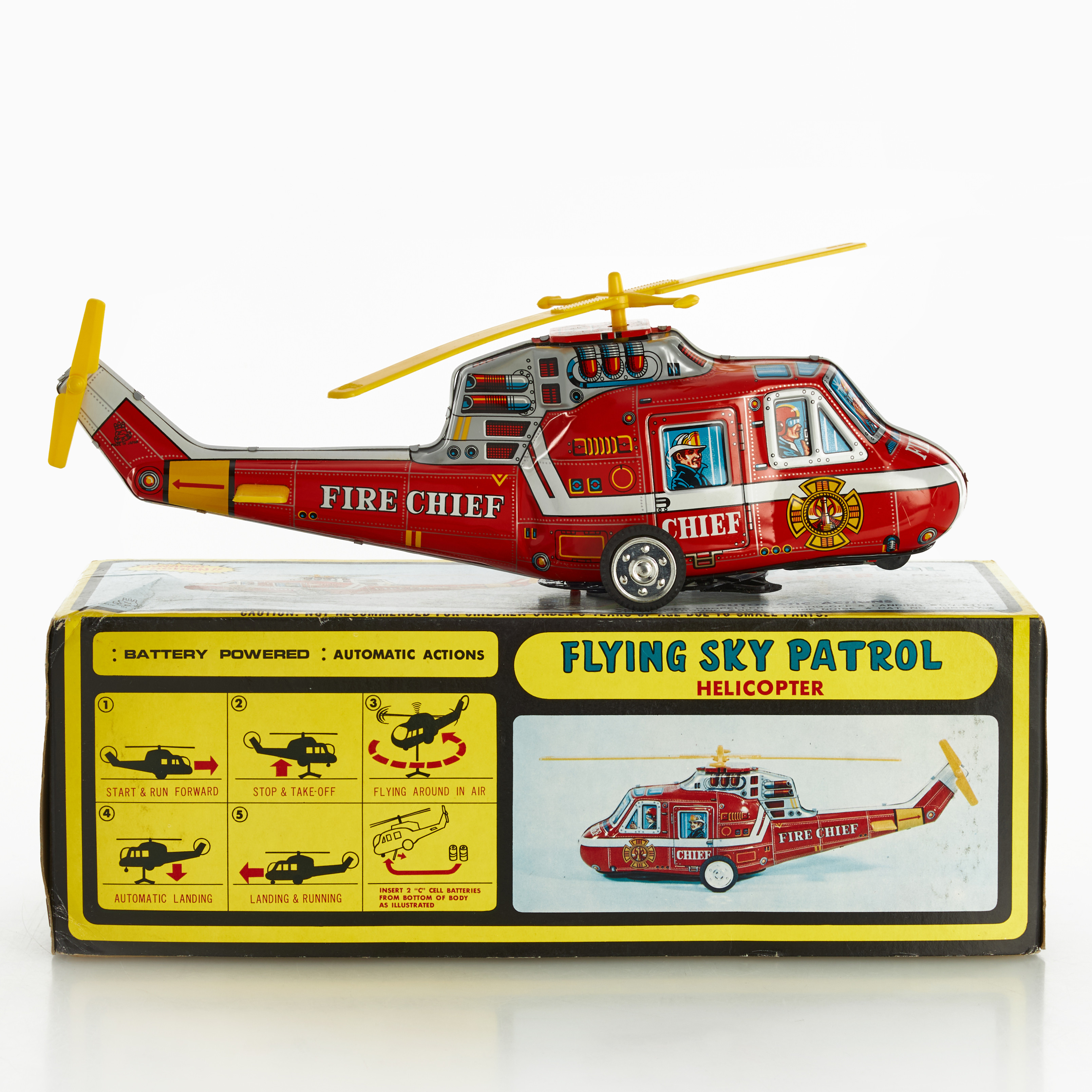 TOPLAY LTD. Helikopter, "Flying Sky Patrol", 1900-talets andra hälft, litograferad plåt, batteri, i orginalkartong.