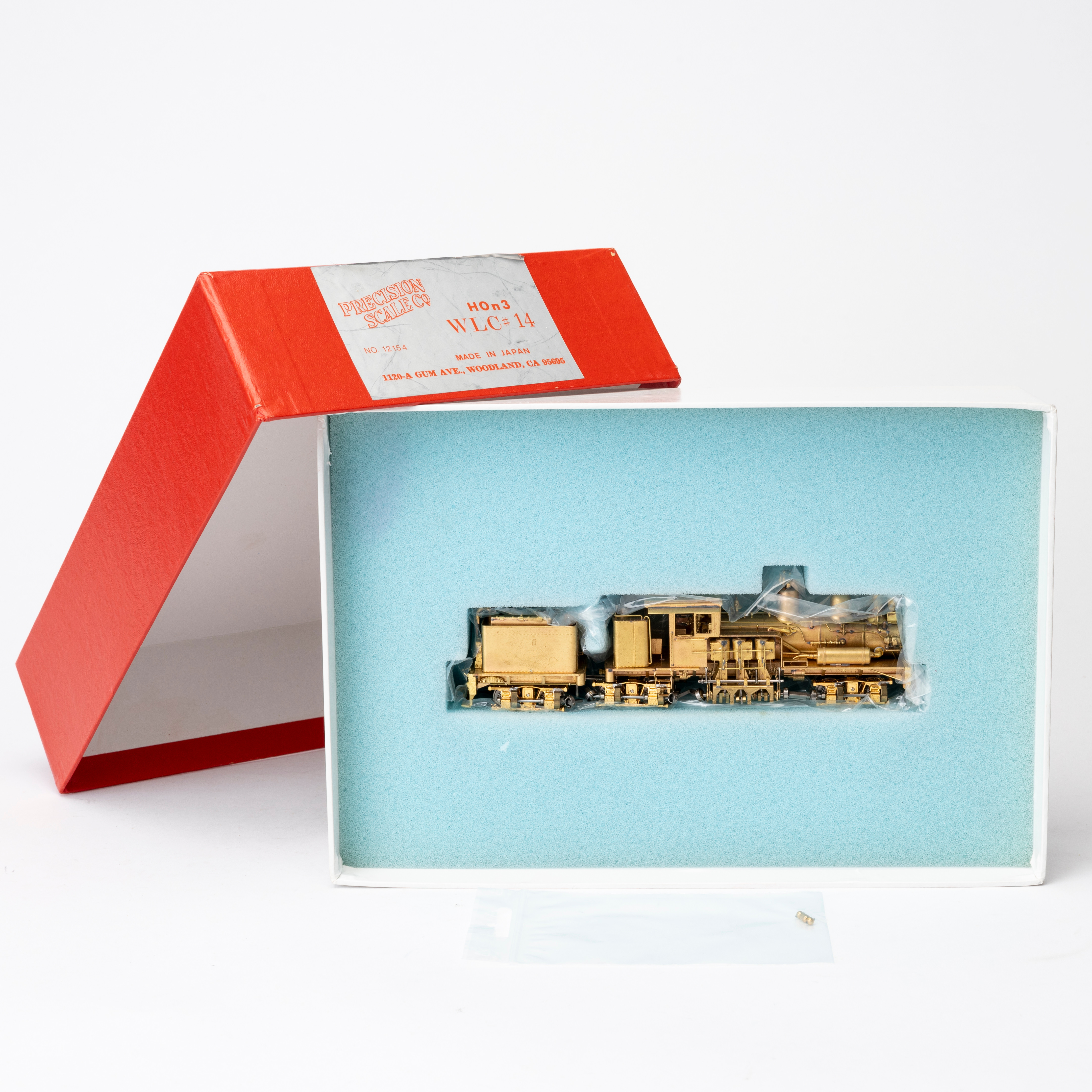 PRECISION Scale WLC 14, no 12154, amerikanskt ånglok med tender, Shay , handbyggd mässing , Japan, originalförpackning.
