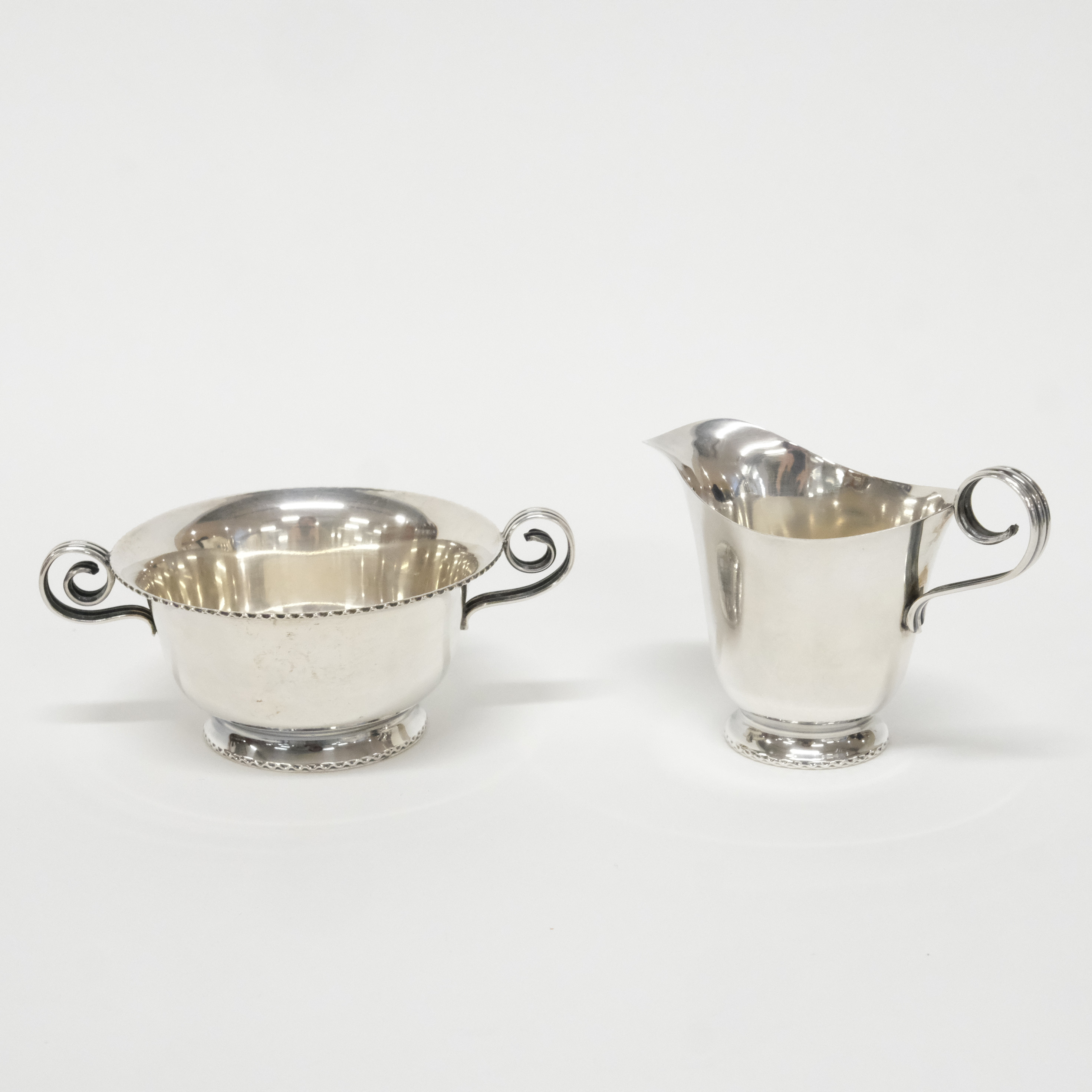 SOCKERSKÅL OCH GRÄDDSNIPA, SILVER.