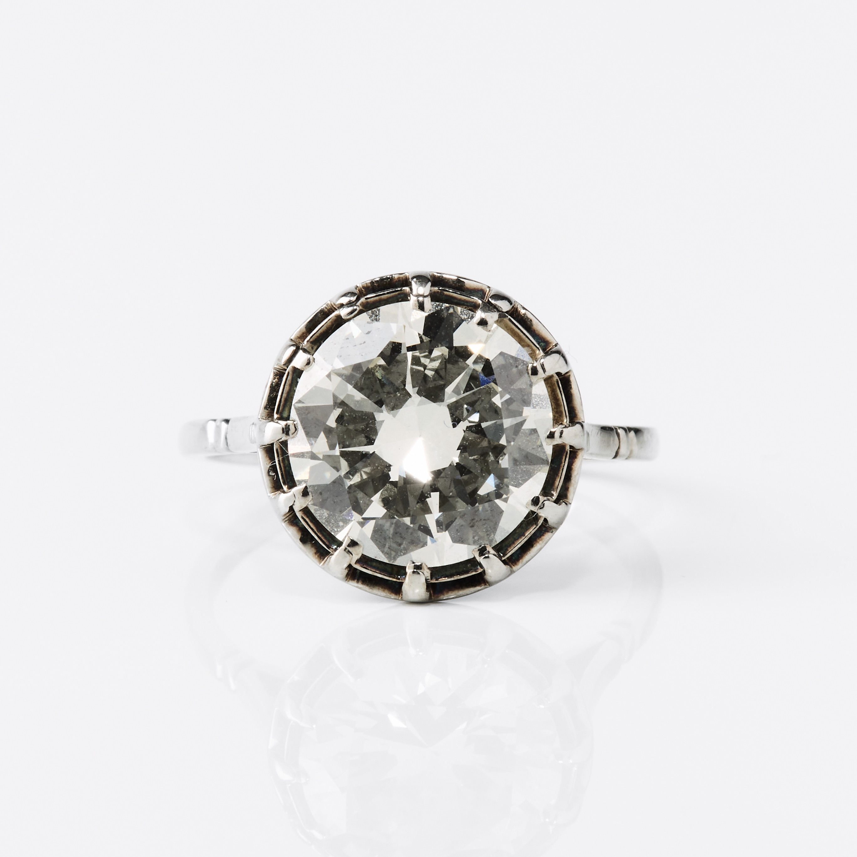 ENSTENSRING, 14K vitguld med en diamant. Italien 1920-tal.