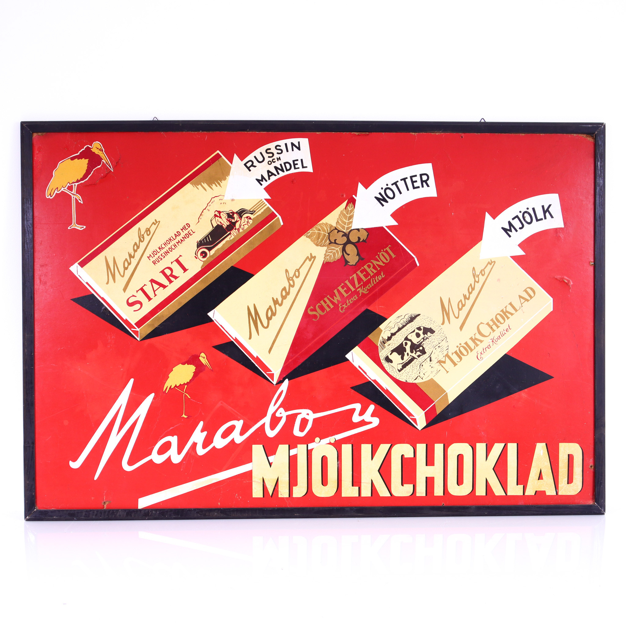 MARABOU MJÖLKCHOKLAD, skylt på masonite, 1900-talets första hälft.