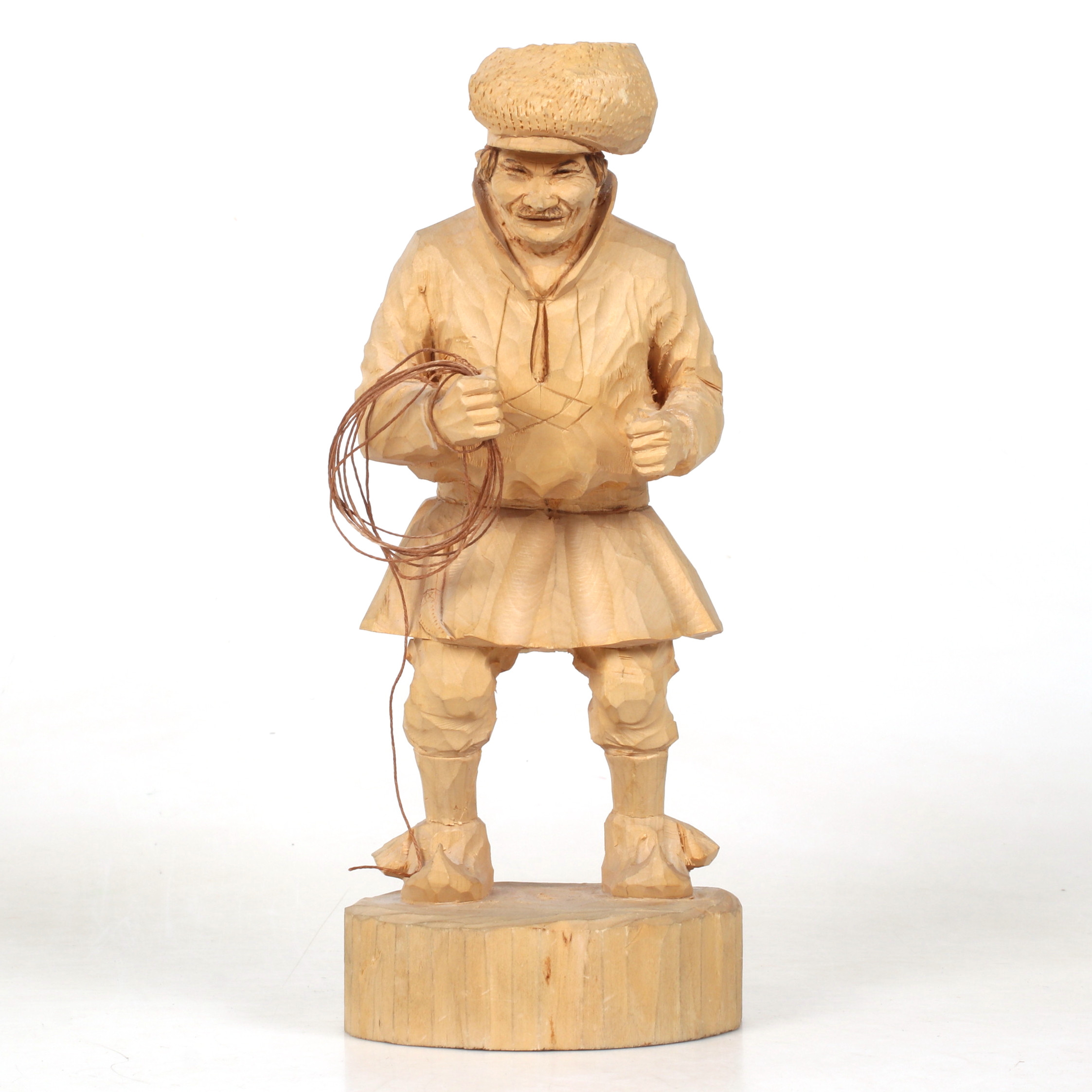 BENGT FRANSSON. "Lassokastare", snidat trä, signerad och daterad 1969.