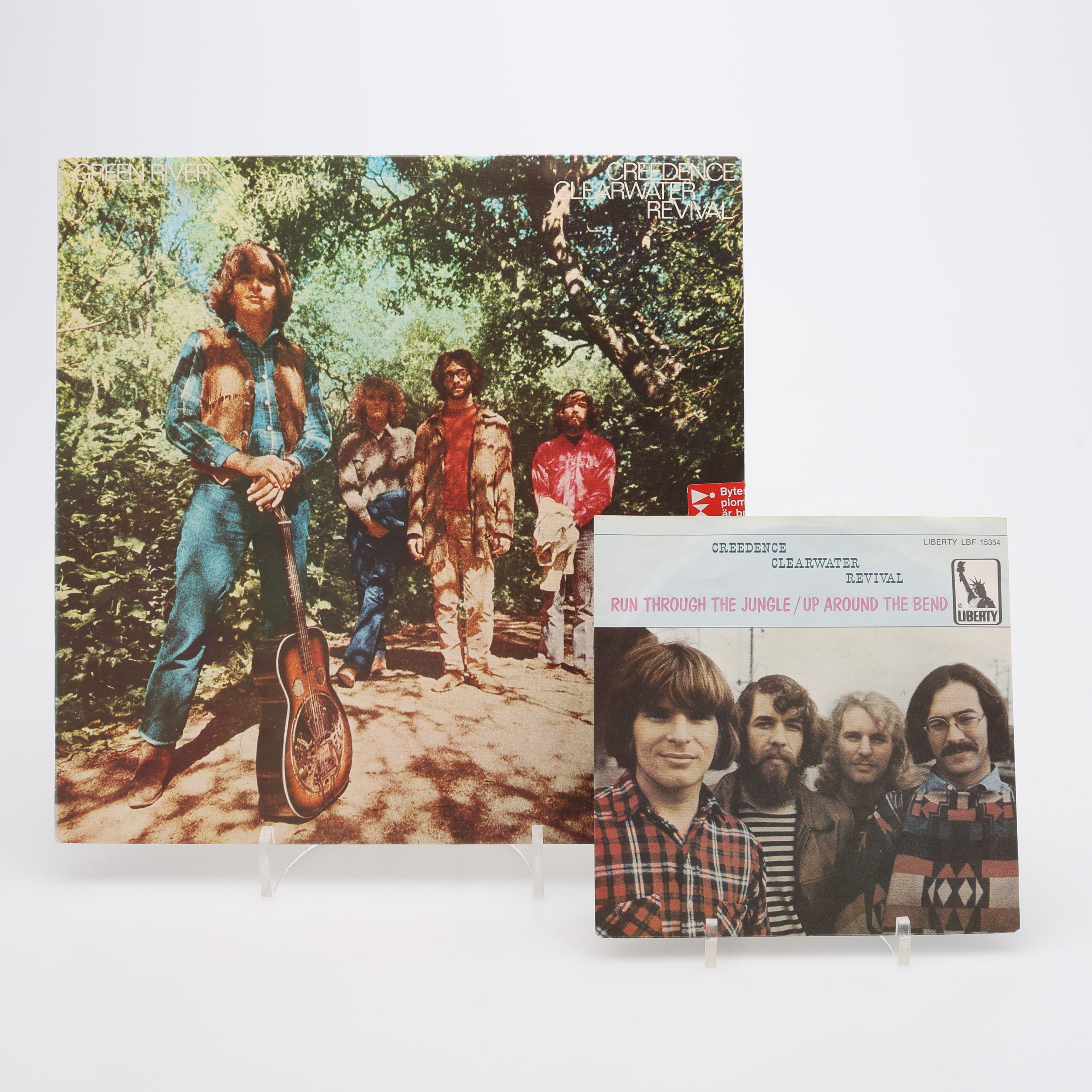 CREEDENCE CLEARWATER REVIVAL, "GREEN RIVER" LP OCH "RUN THROUGH THE JUNGLE/ UP AROUND THE BEND" SINGEL.