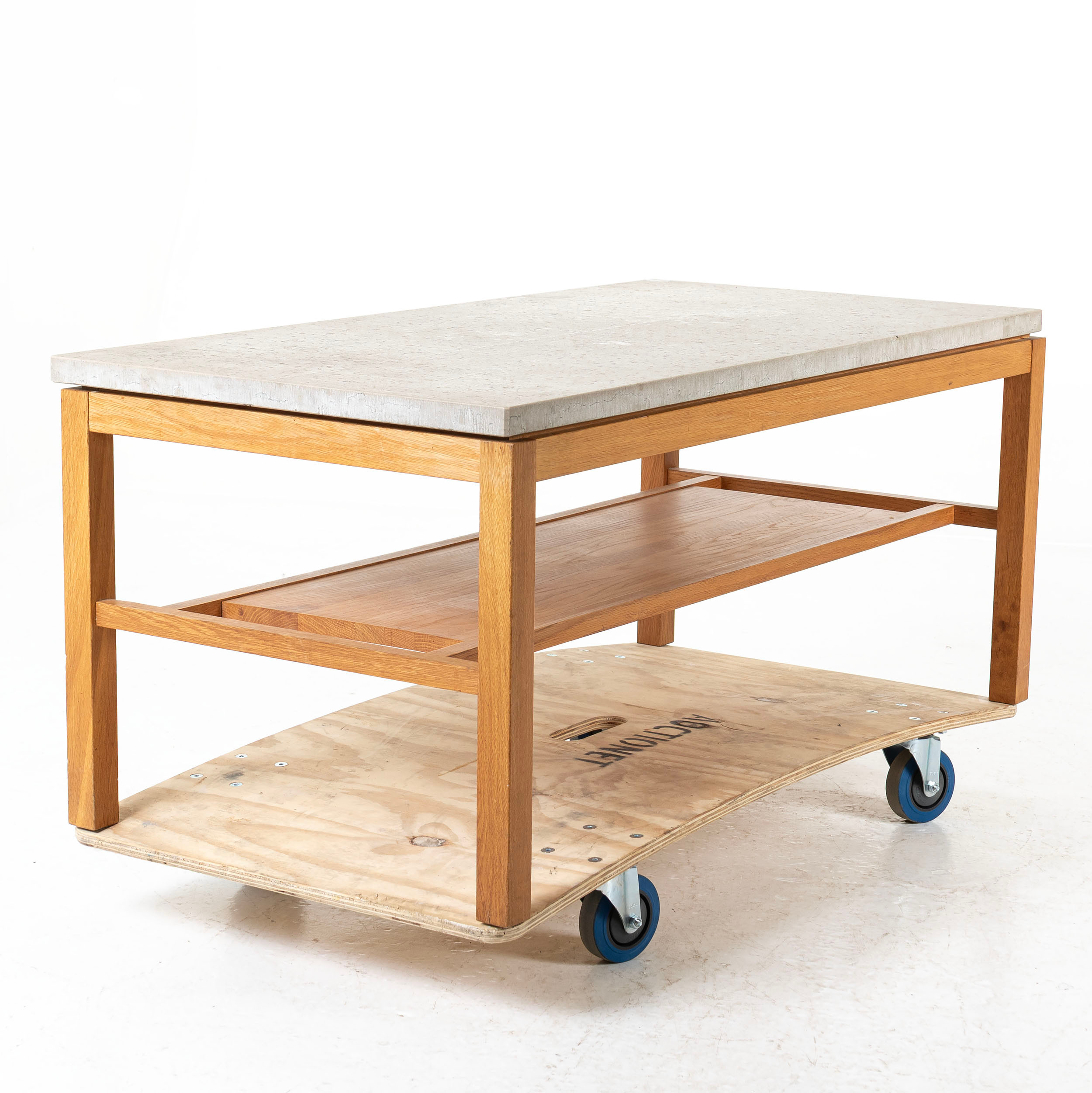 KRISTIAN ERIKSSON. "Hejnum", soffbord, G.A.D, benställning i ek med skiva i kalksten, Gotland.