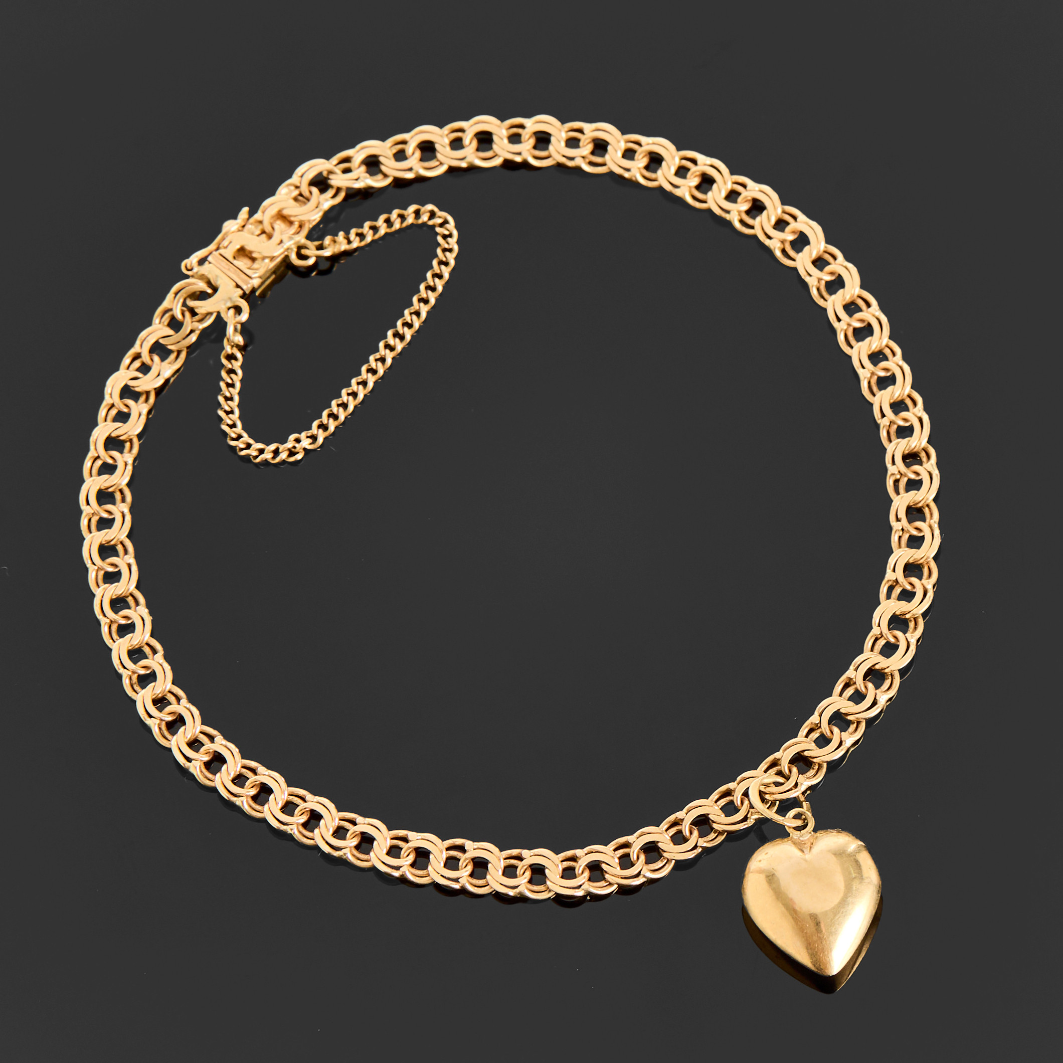 BERLOCKARMBAND, 18k guld, bismarck-länk med ett hjärta, Mattinsons Ringfabrikation C A, 1960, Stockholm.